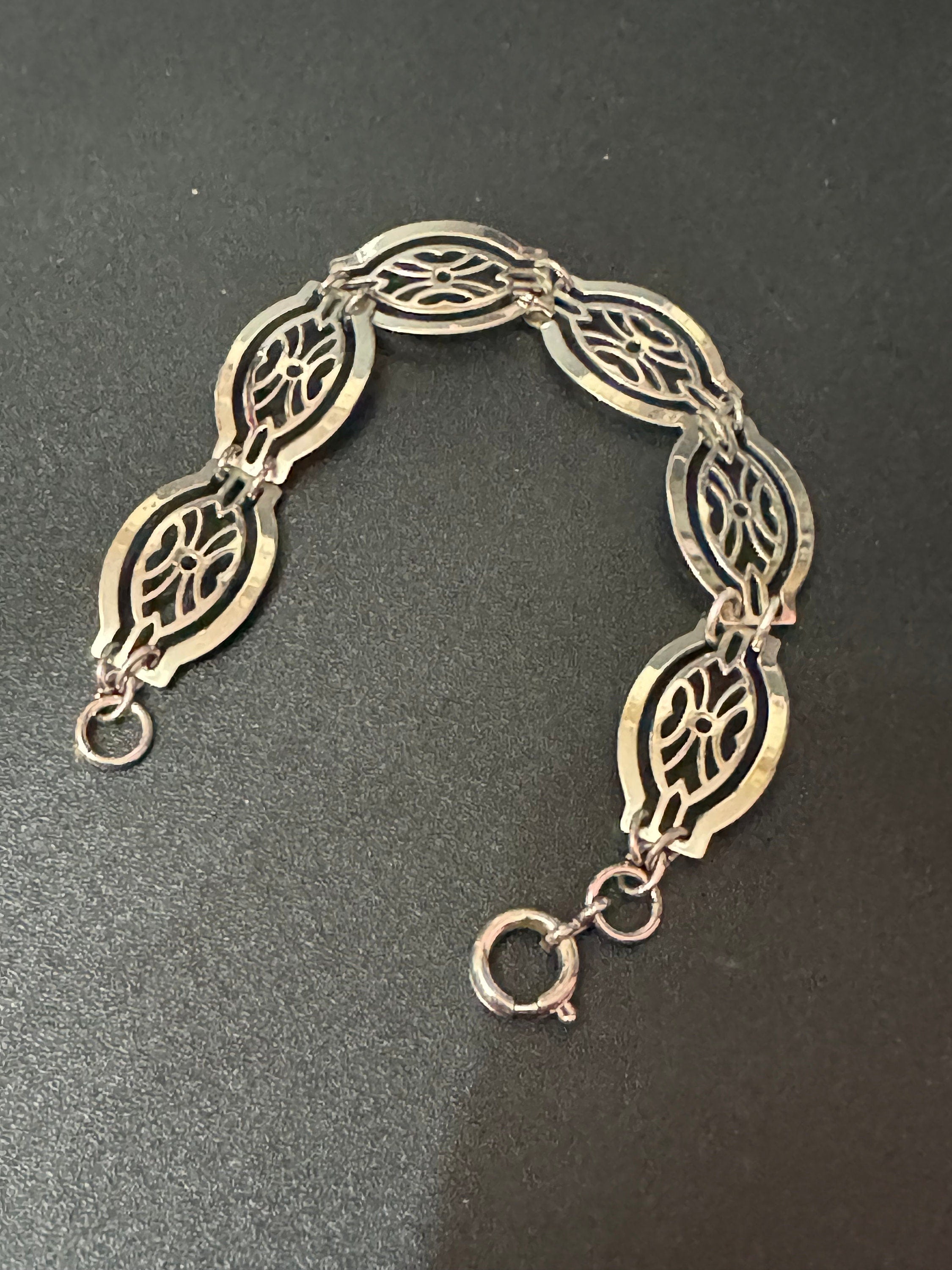 Silver tone fine Open work panel link bracelet 18cm