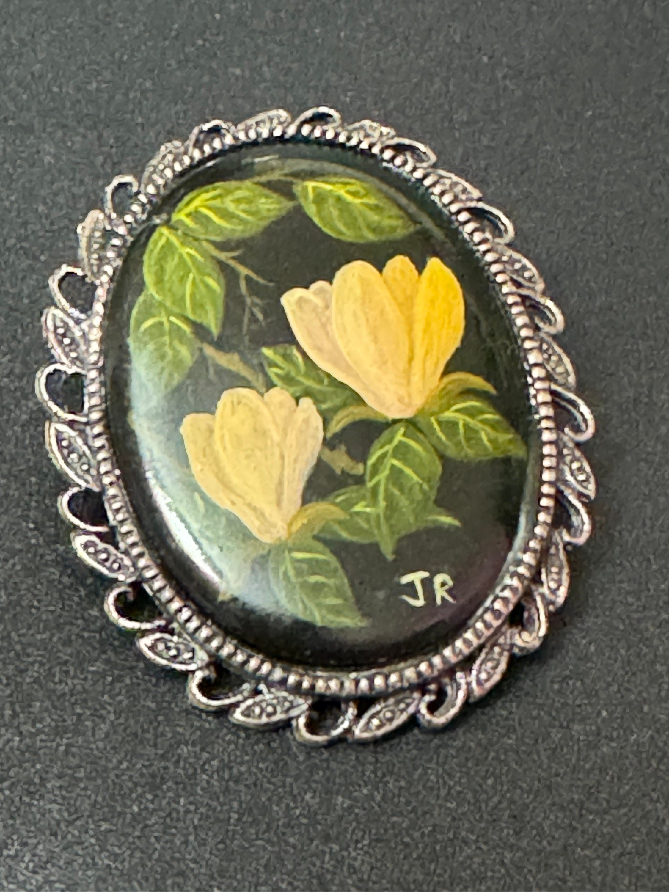 Vintage hand painted crocus floral brooch with detailed edge silver tone