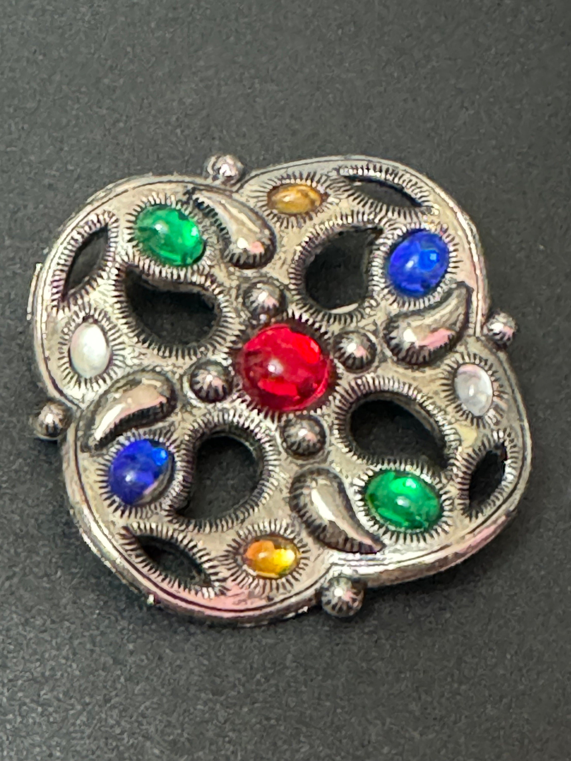 Large plastic Gripoix style cabochon domed open work abstract brooch silver tone