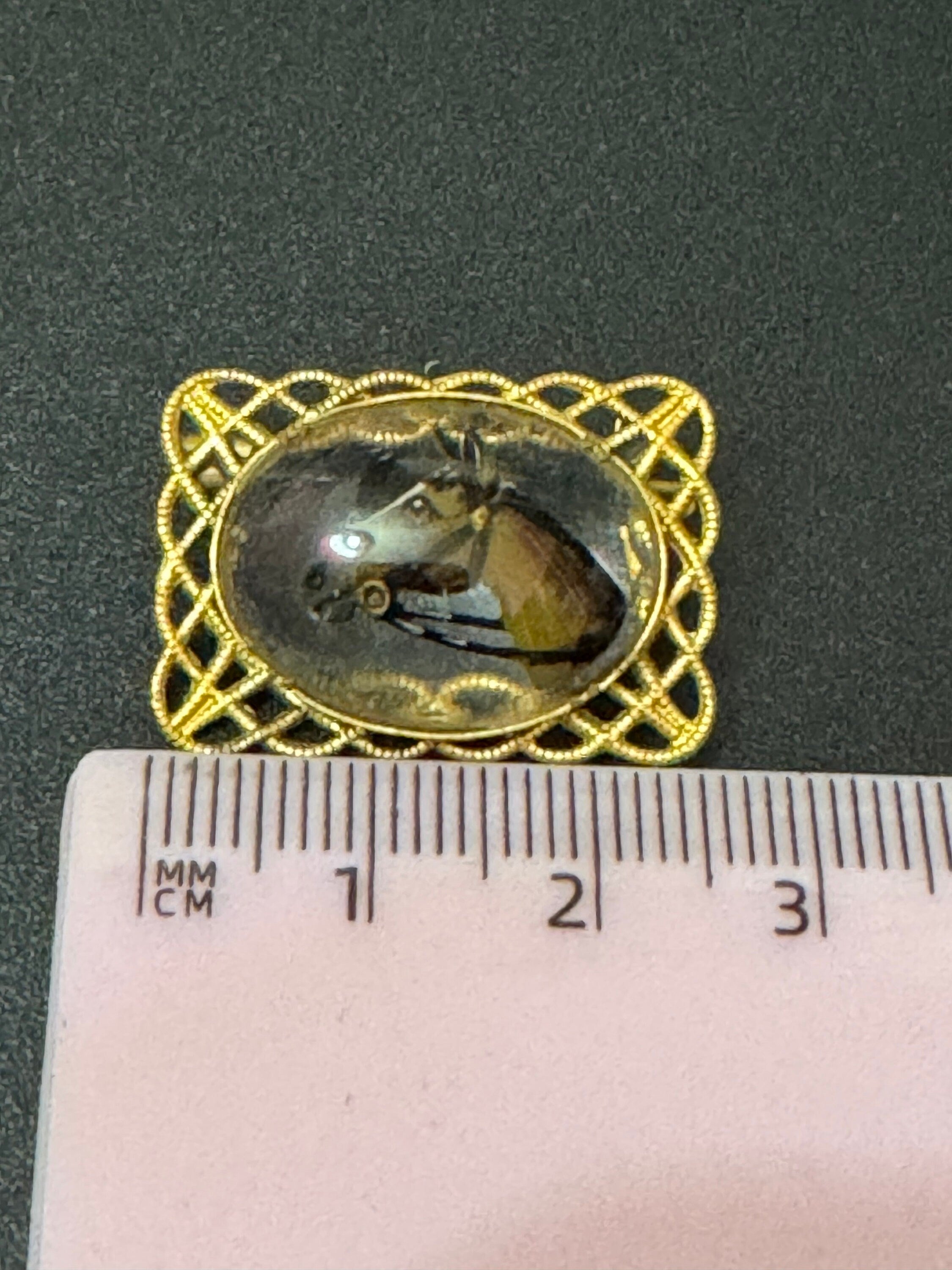 Antique small 2.5cm filigree reverse painted horse head brooch