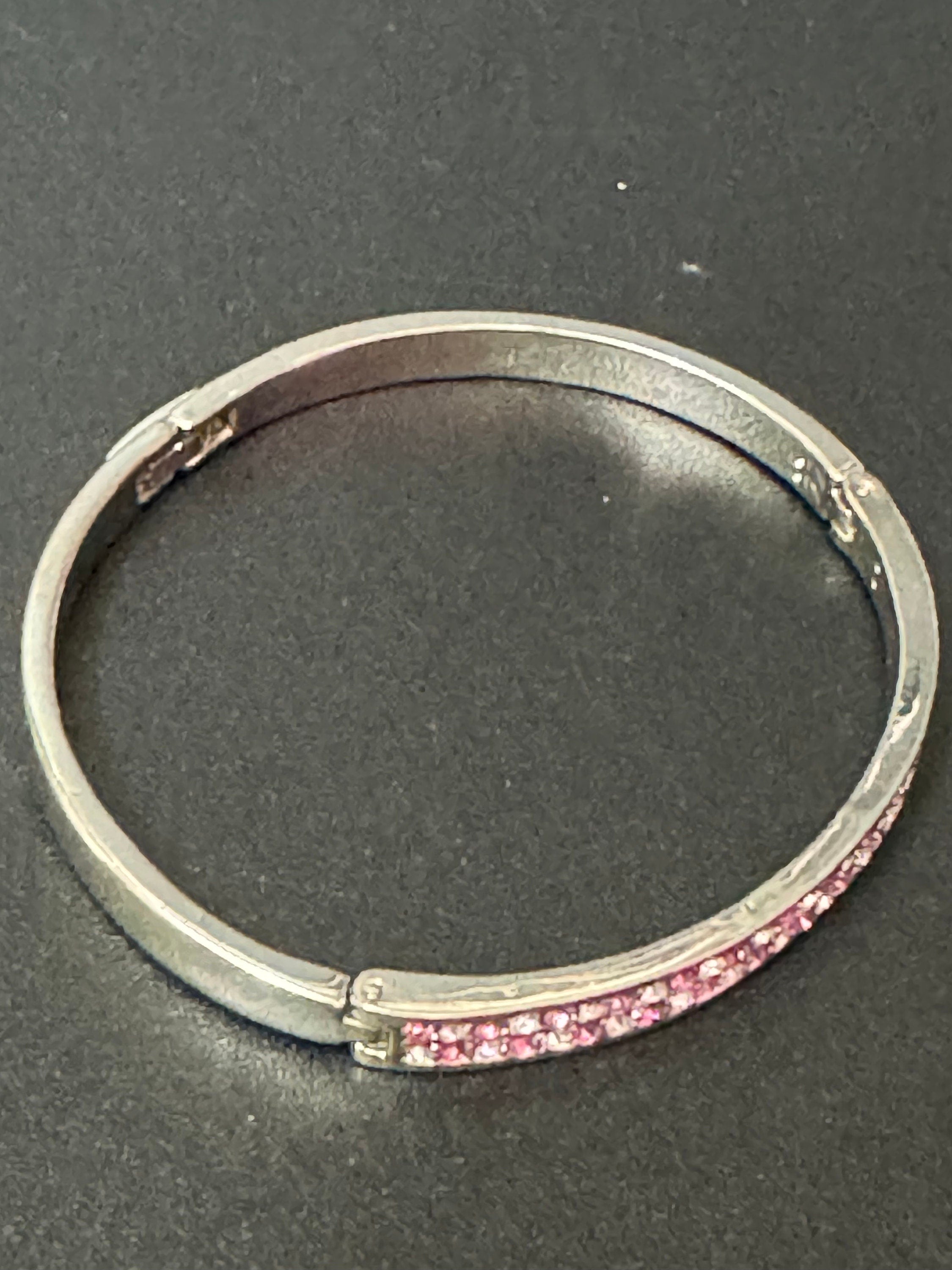 Vintage slim silver tone hinged bangle bracelet with pink glass rhinestones crystals