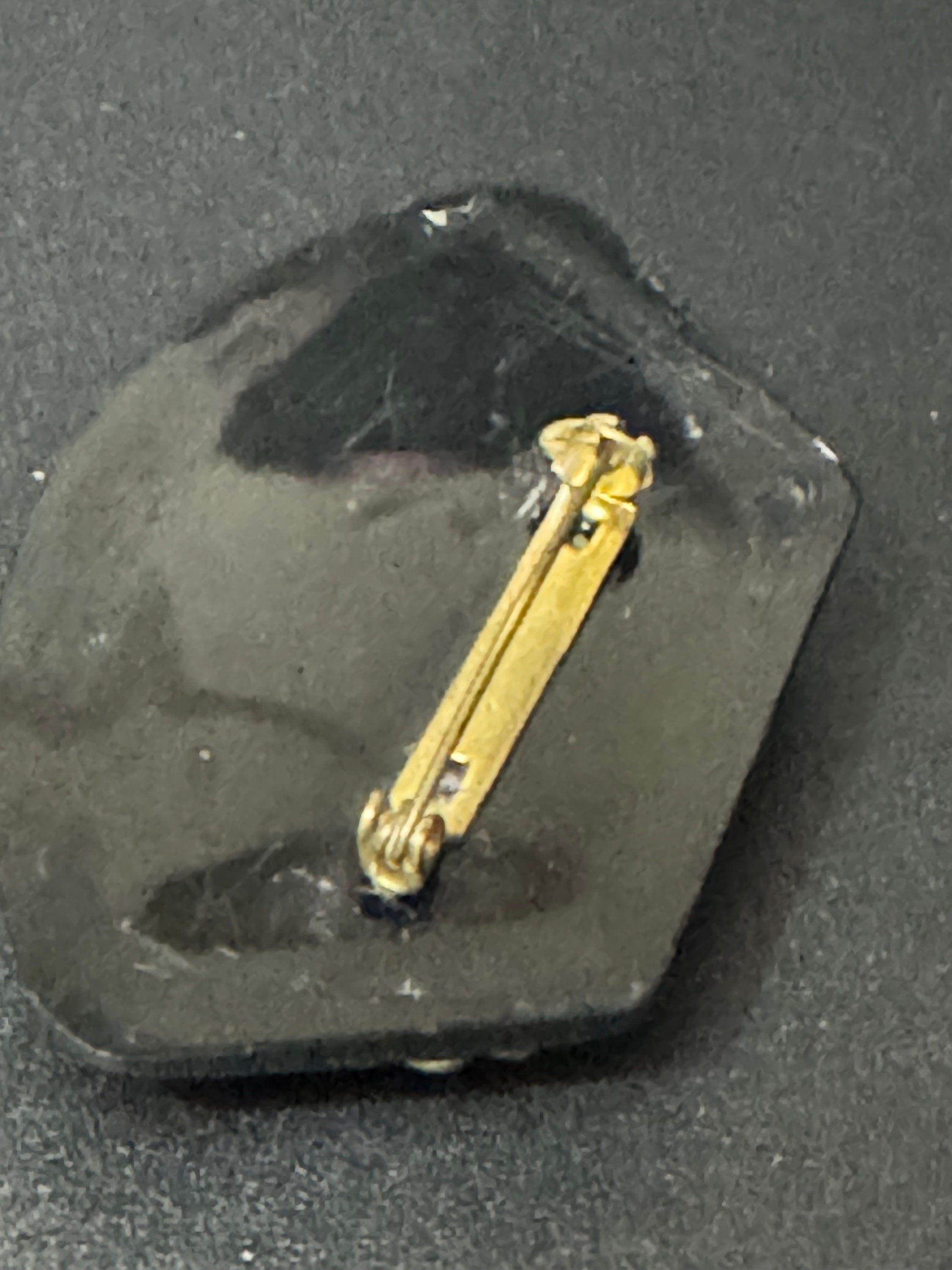 Vintage gold tone black early plastic rhinestone cornucopia brooch