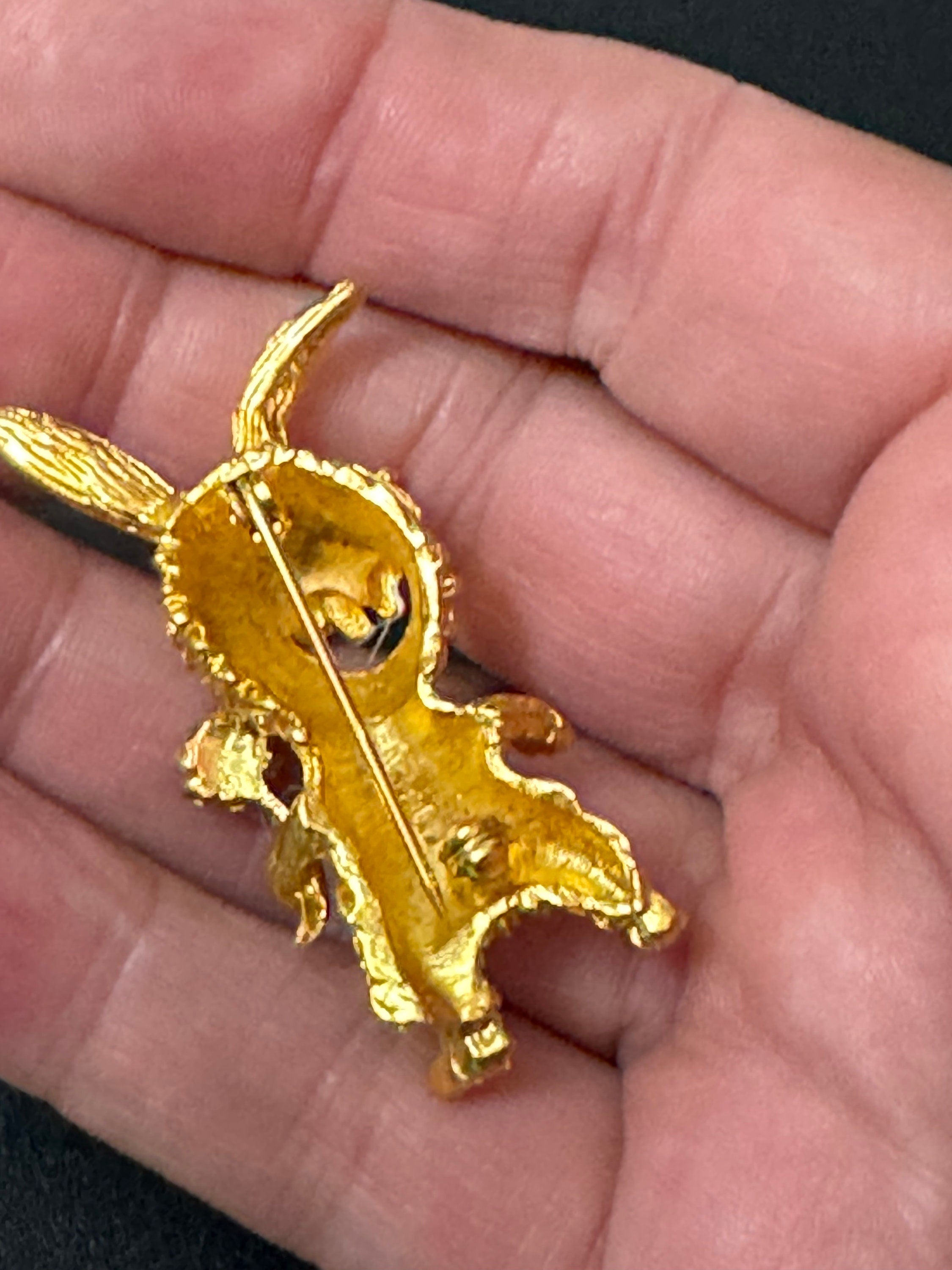 Novelty vintage cartoon rabbit brooch gold tone with clear diamanté and emerald eyes