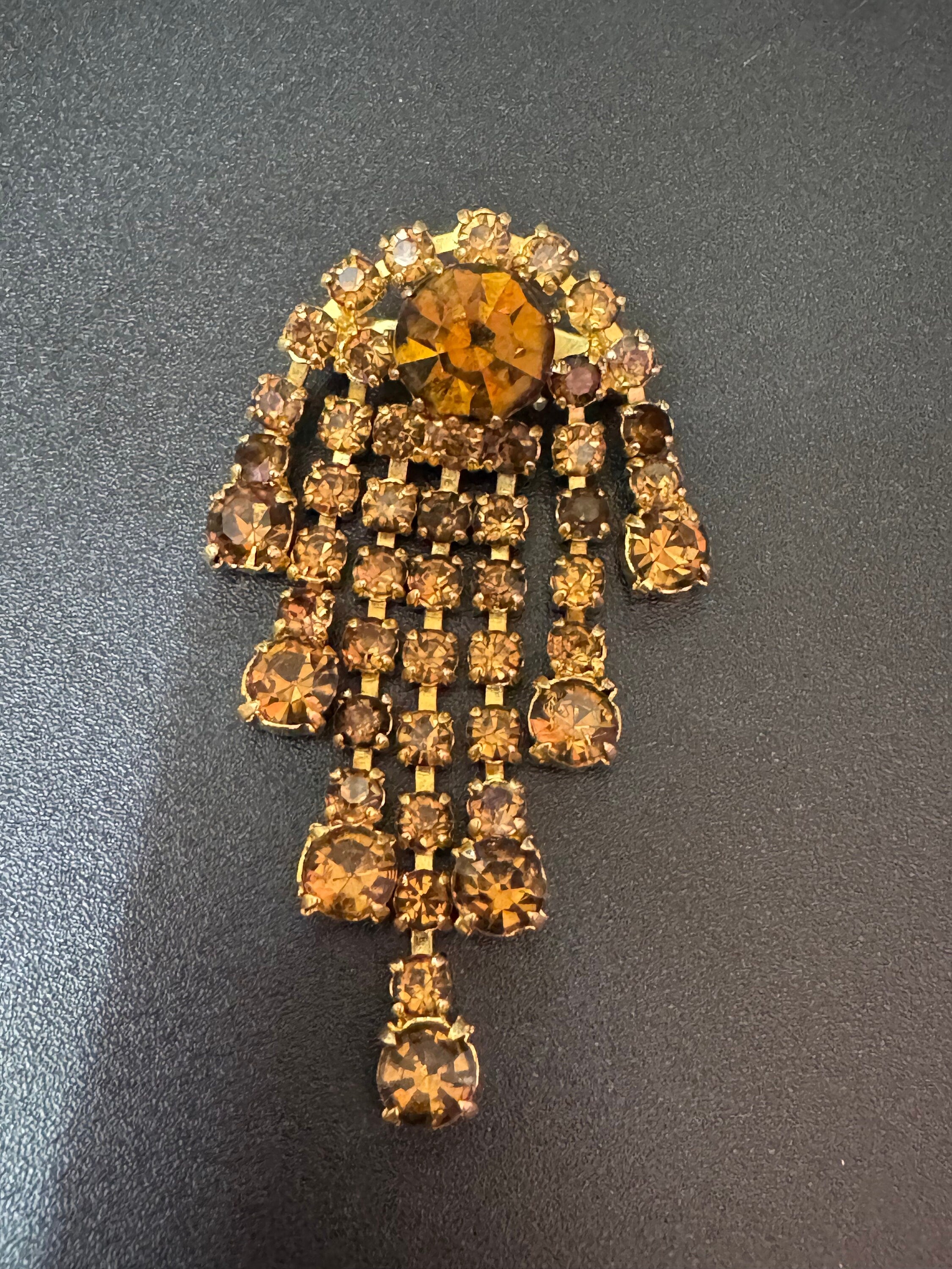 vintage gold tone waterfall brooch with large diamanté brown cognac glass stones