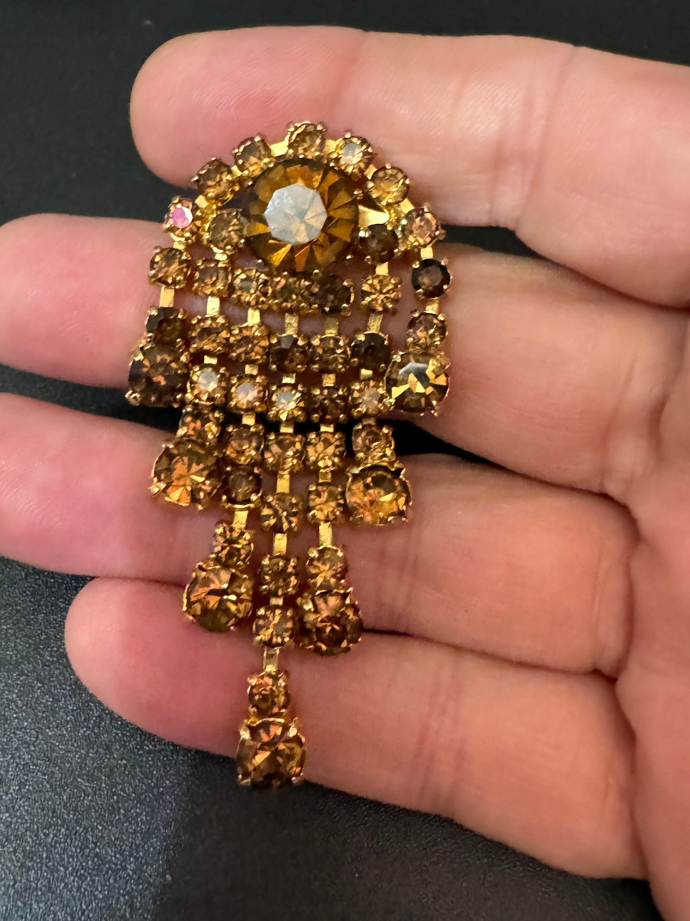 vintage gold tone waterfall brooch with large diamanté brown cognac glass stones