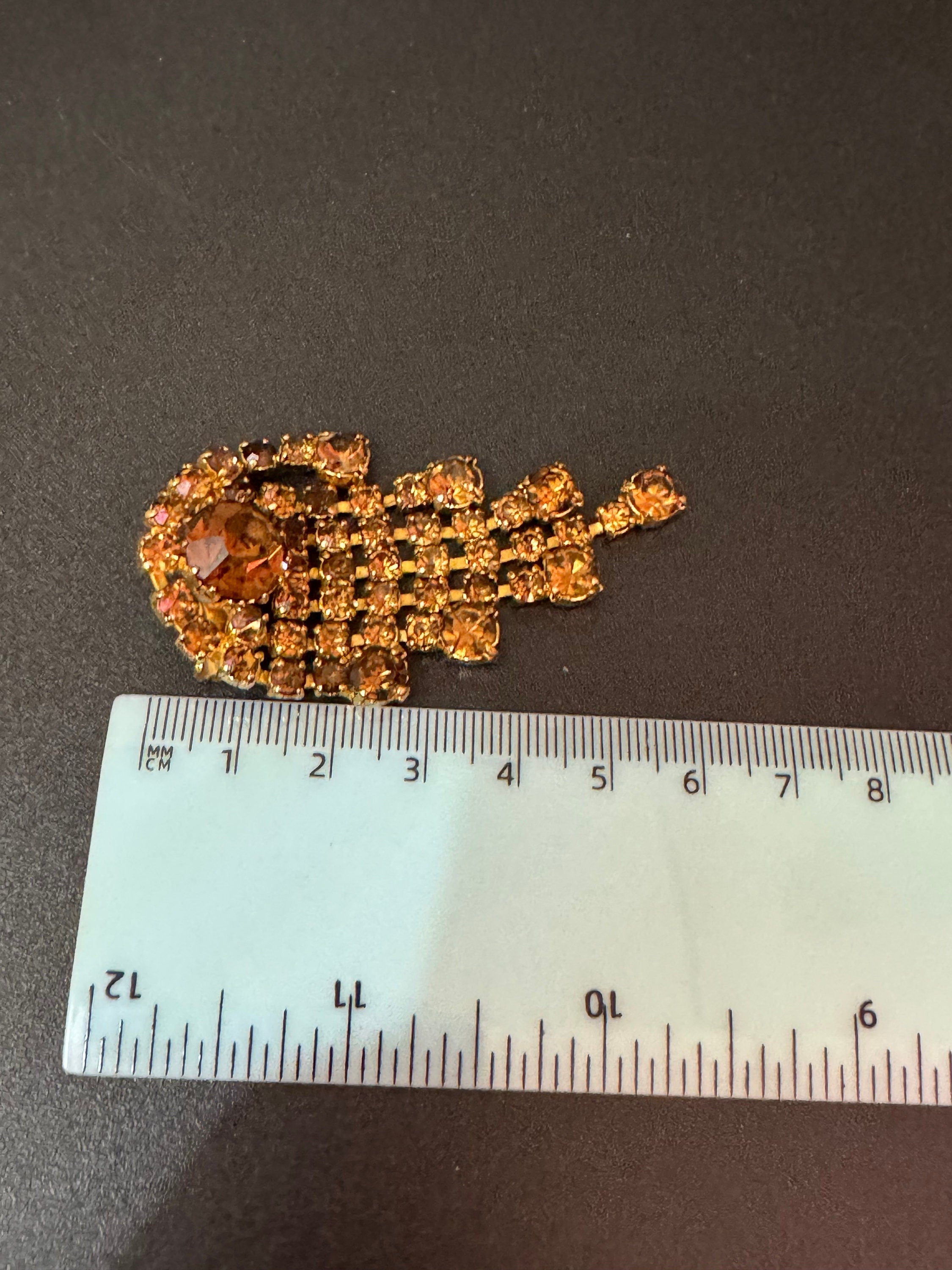 vintage gold tone waterfall brooch with large diamanté brown cognac glass stones
