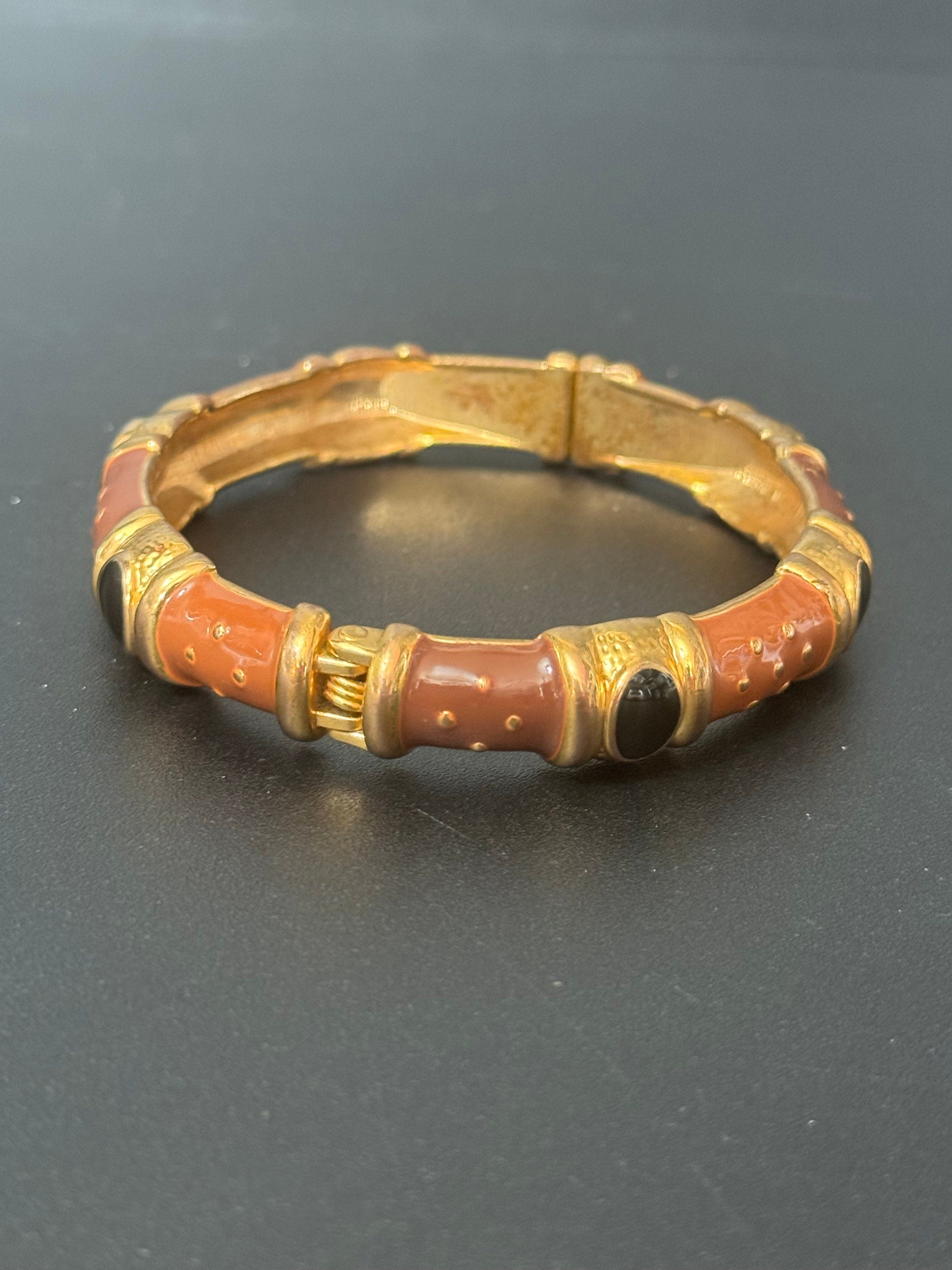 Signed Joan rivers gold plated brown black enamel clamper bangle cuff bracelet