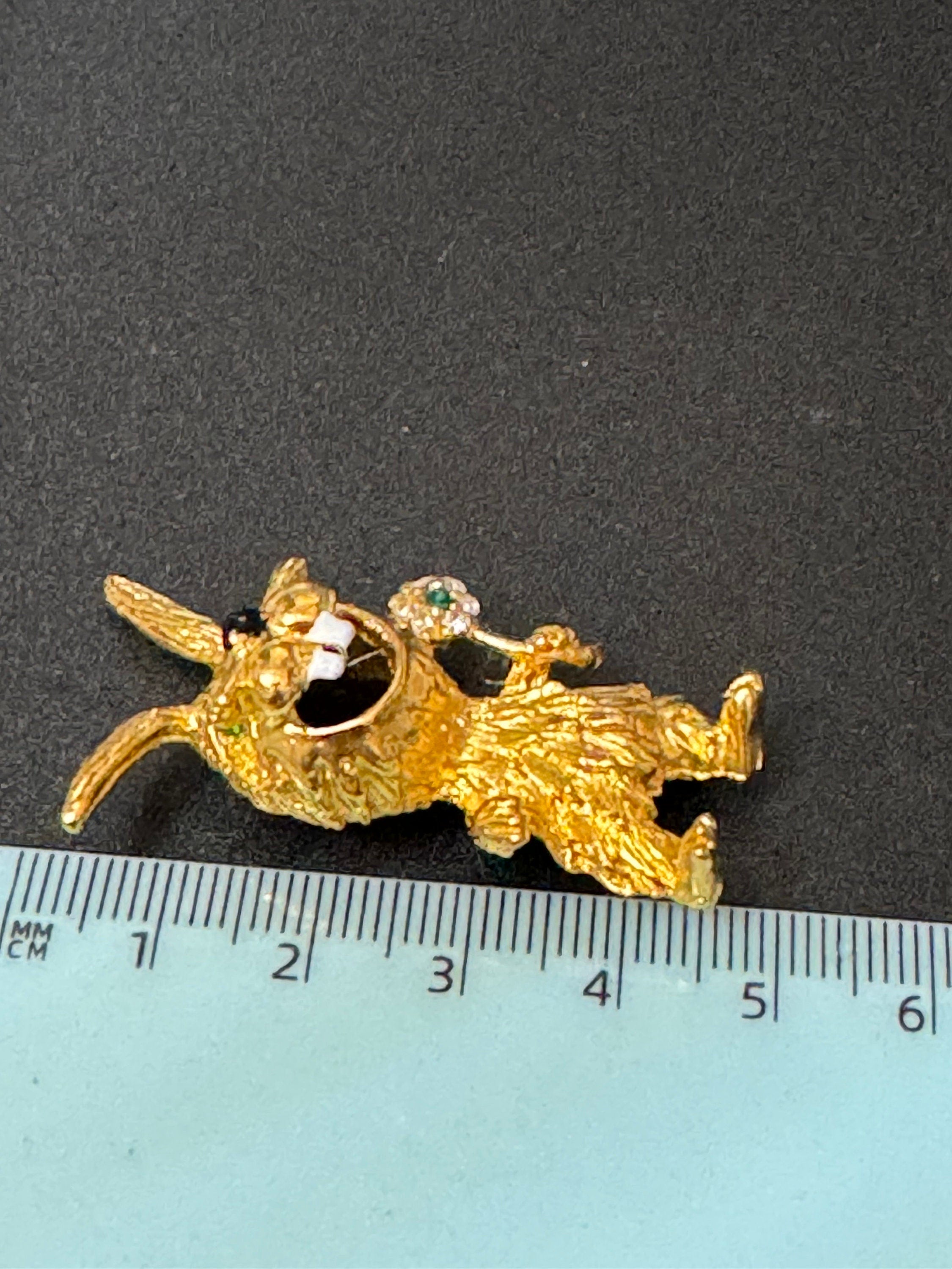 Novelty vintage cartoon rabbit brooch gold tone with clear diamanté and emerald eyes