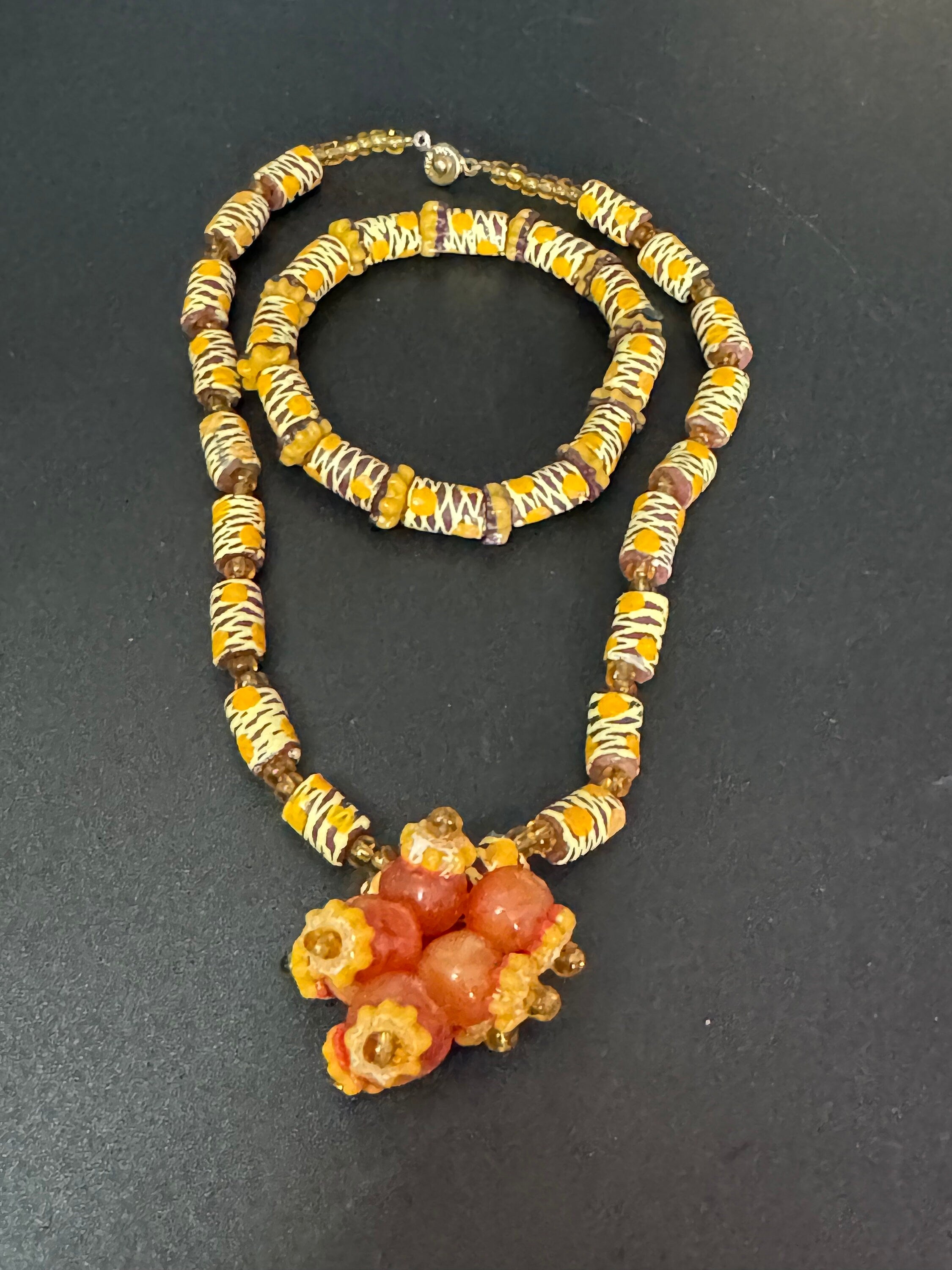 Signed Teng Yue african colours red ochre and mustard glass beaded necklace and stretch bracelet jewellery set