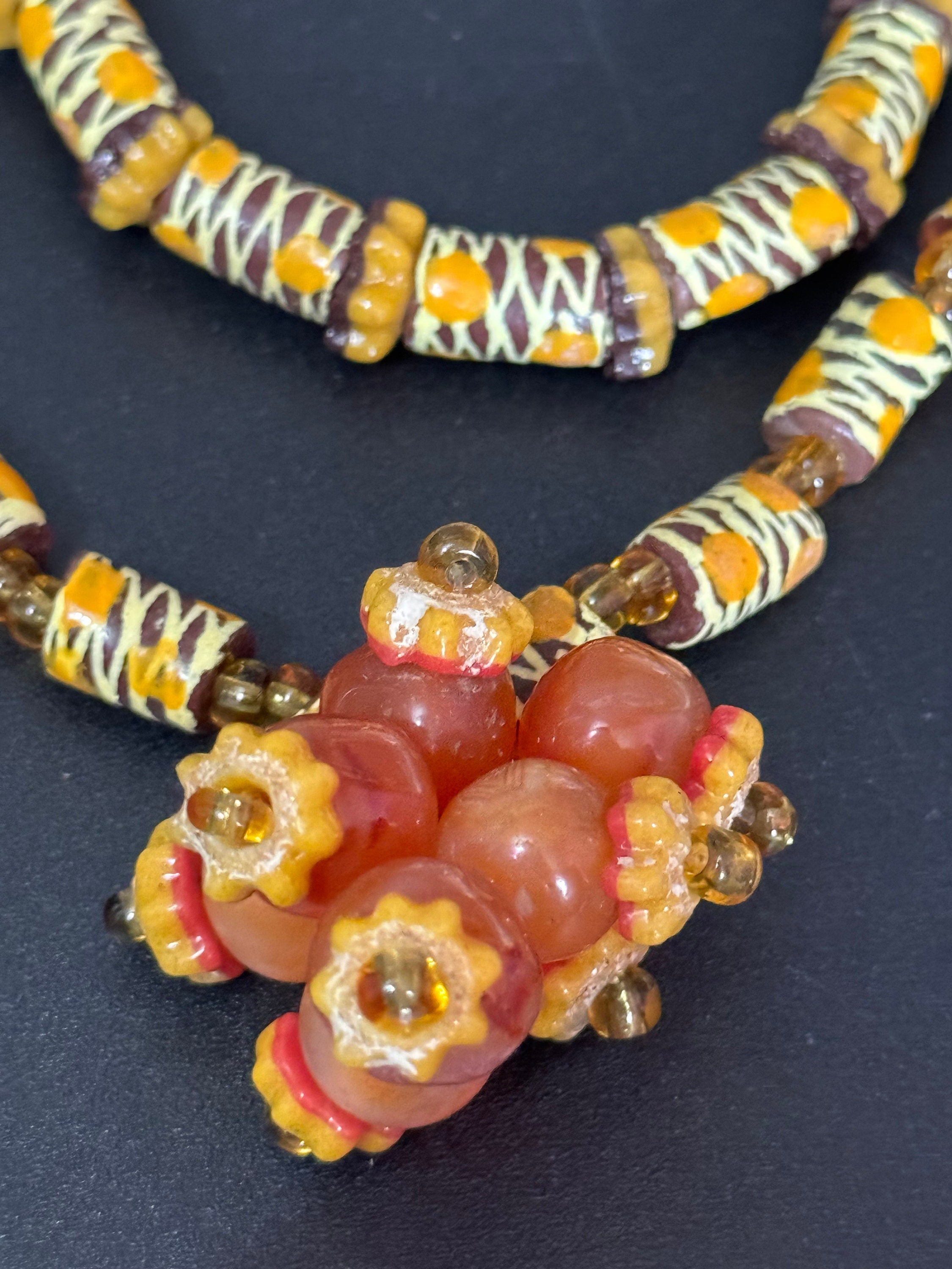 Signed Teng Yue african colours red ochre and mustard glass beaded necklace and stretch bracelet jewellery set