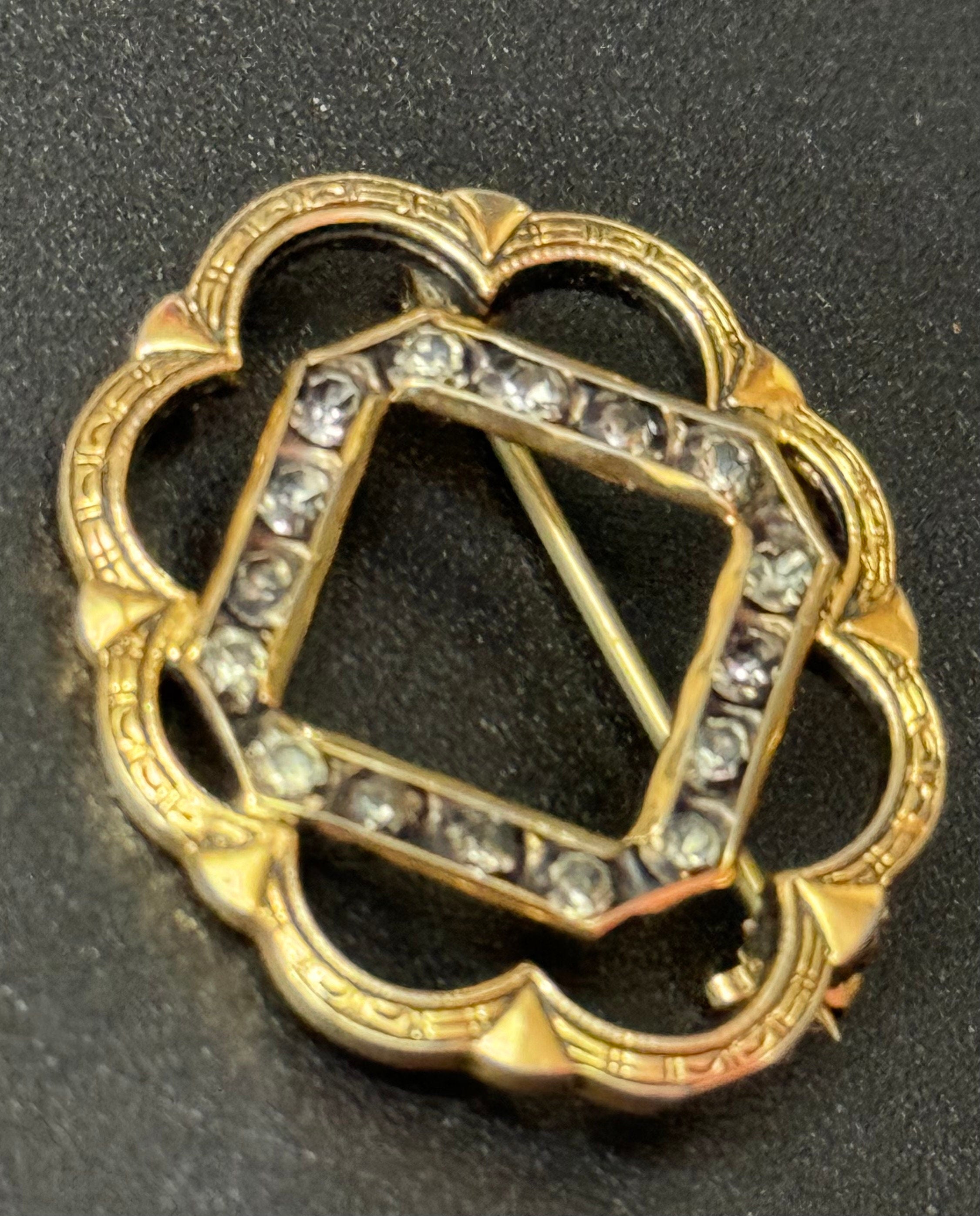 antique small gold plated black diamanté rhinestone brooch roll clasp