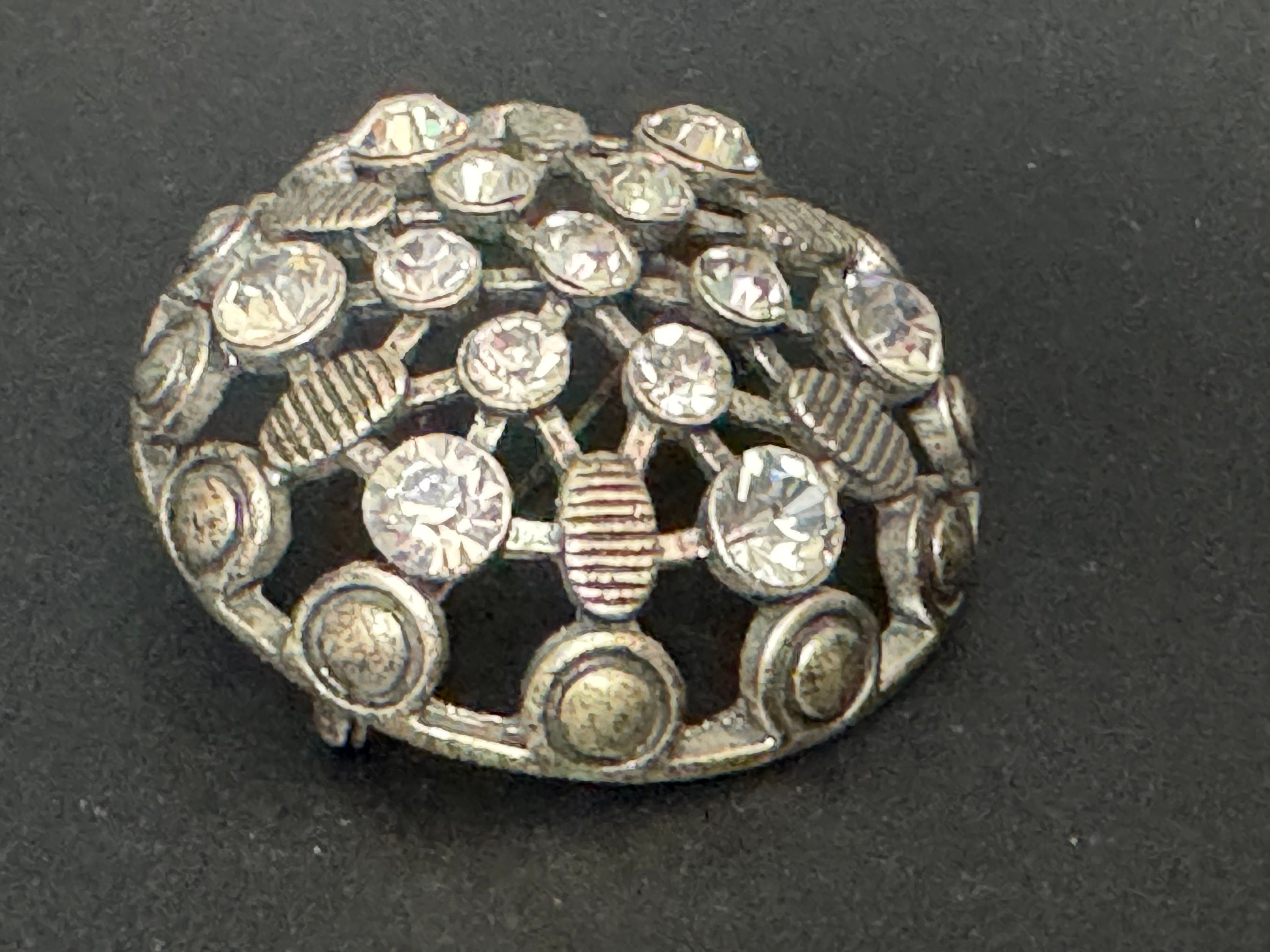 Vintage clear rhinestone diamanté domed round brooch roll clasp