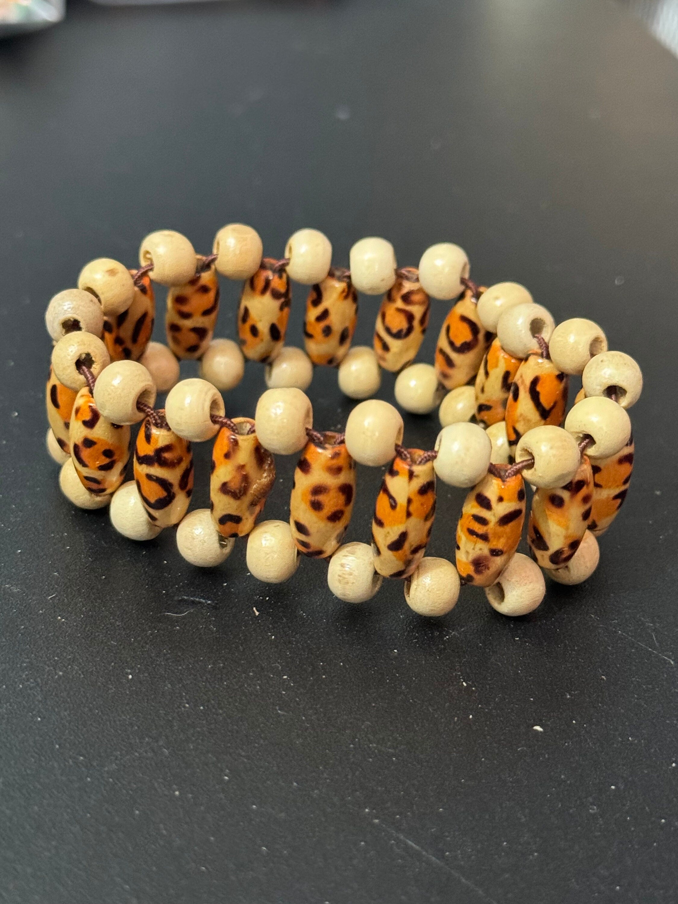 Retro triple row leopard print brown wood and natural nut beaded elasticated stretch bracelet unisex boho beach festival jewellery range