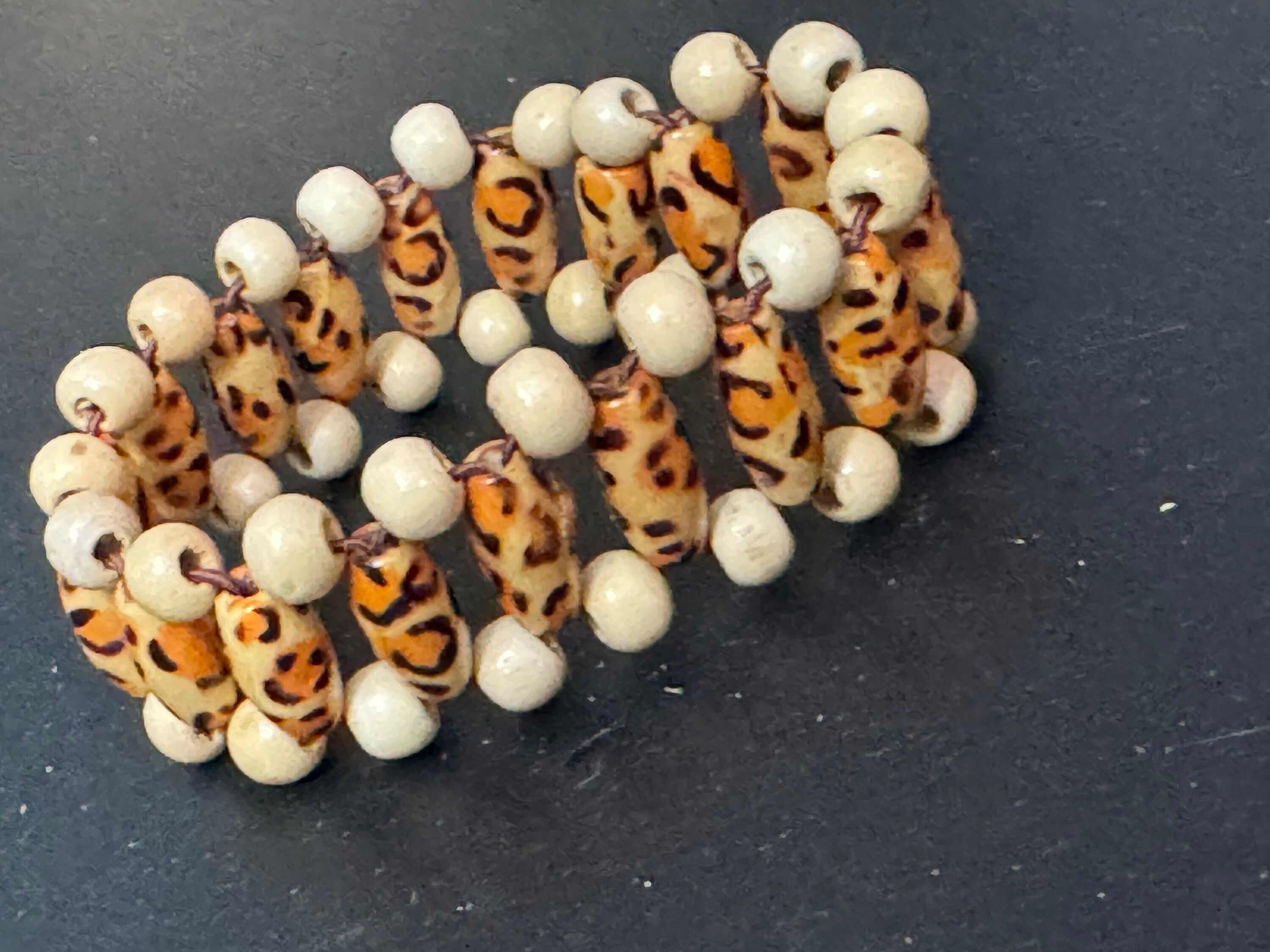 Retro triple row leopard print brown wood and natural nut beaded elasticated stretch bracelet unisex boho beach festival jewellery range