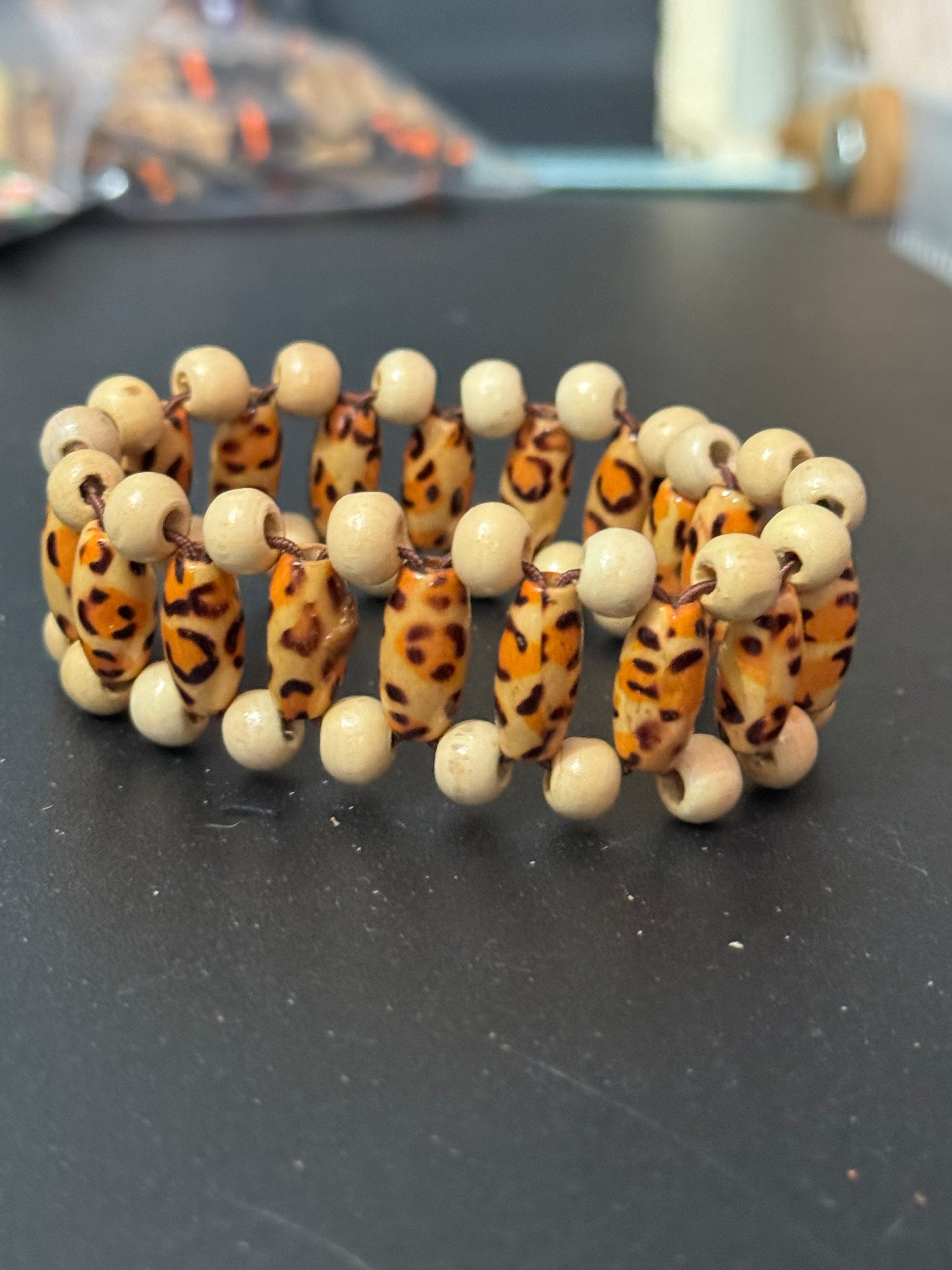 Retro triple row leopard print brown wood and natural nut beaded elasticated stretch bracelet unisex boho beach festival jewellery range