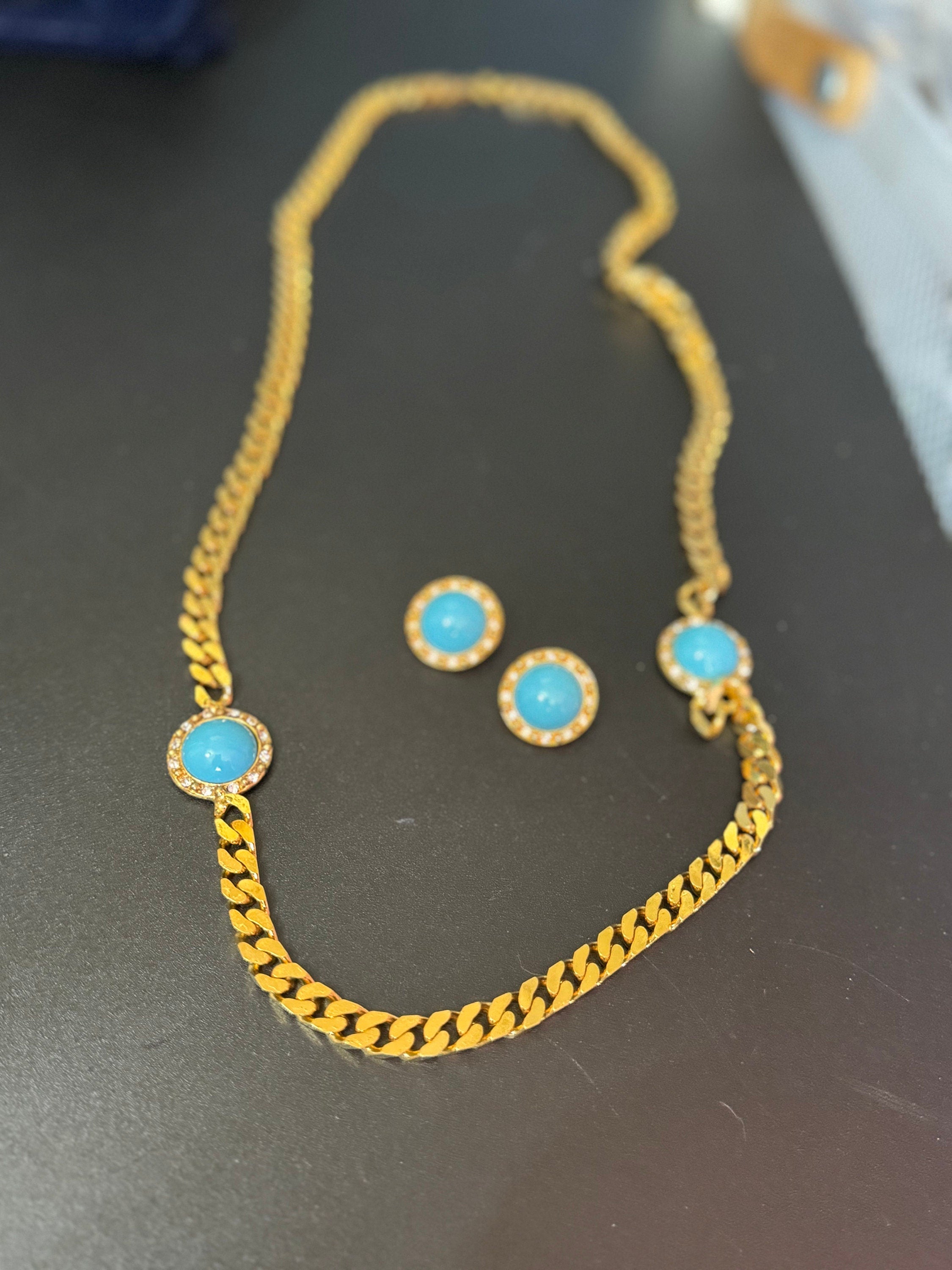 Vintage turquoise blue cabochon clear genuine Swarovski crystal gold tone round rhinestone station necklace and clip on earrings