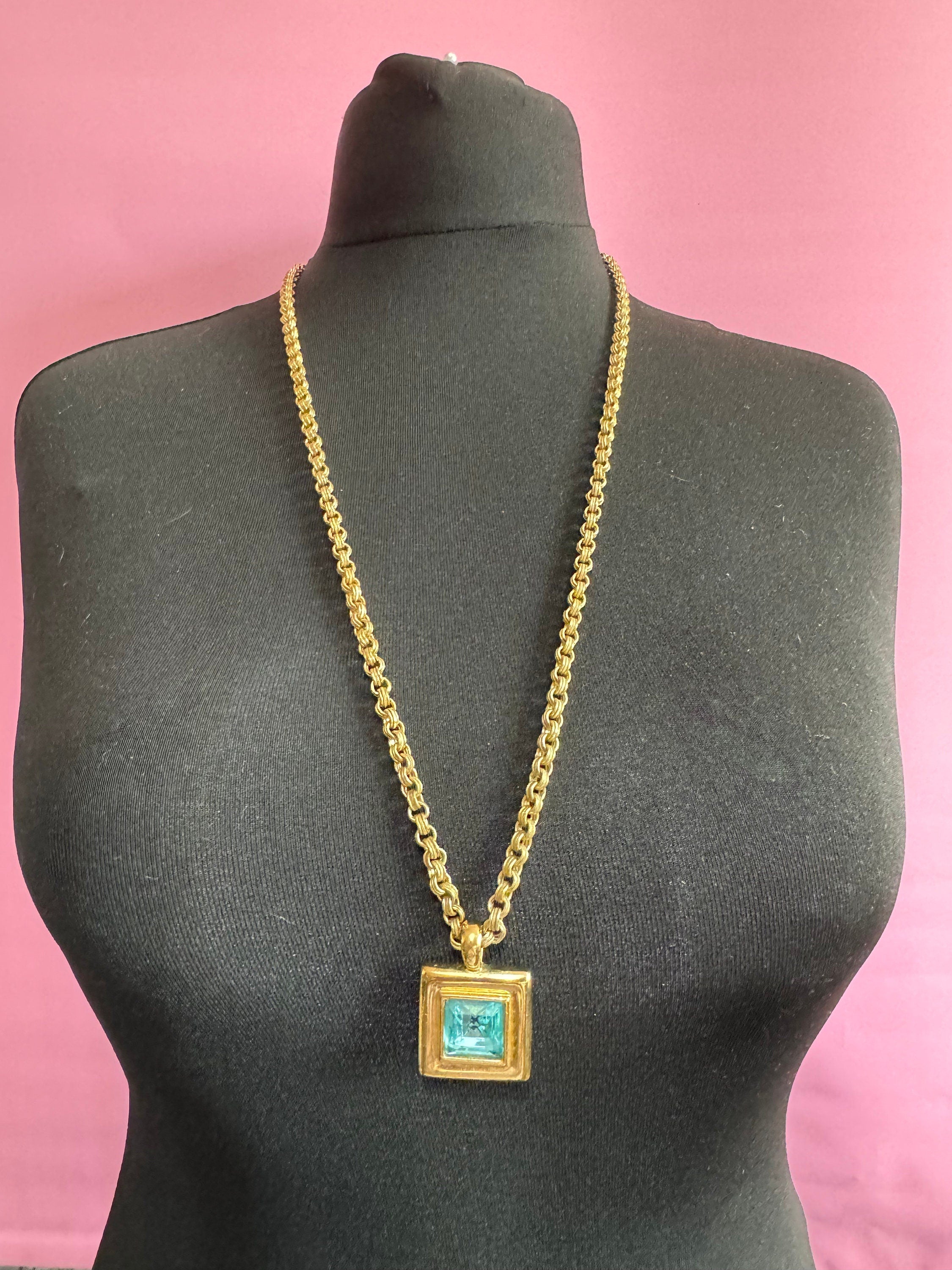Circa 1980s Givenchy, gold plated square turquoise blue crystal pendant necklace on signed 80cm toggle chain, New York designer