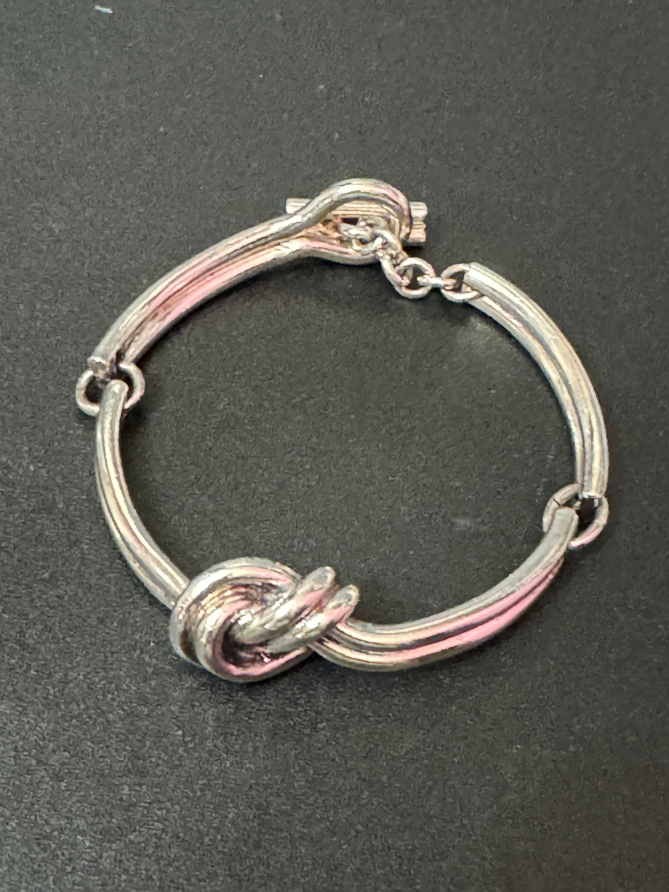 Agatha silver tone knot bracelet