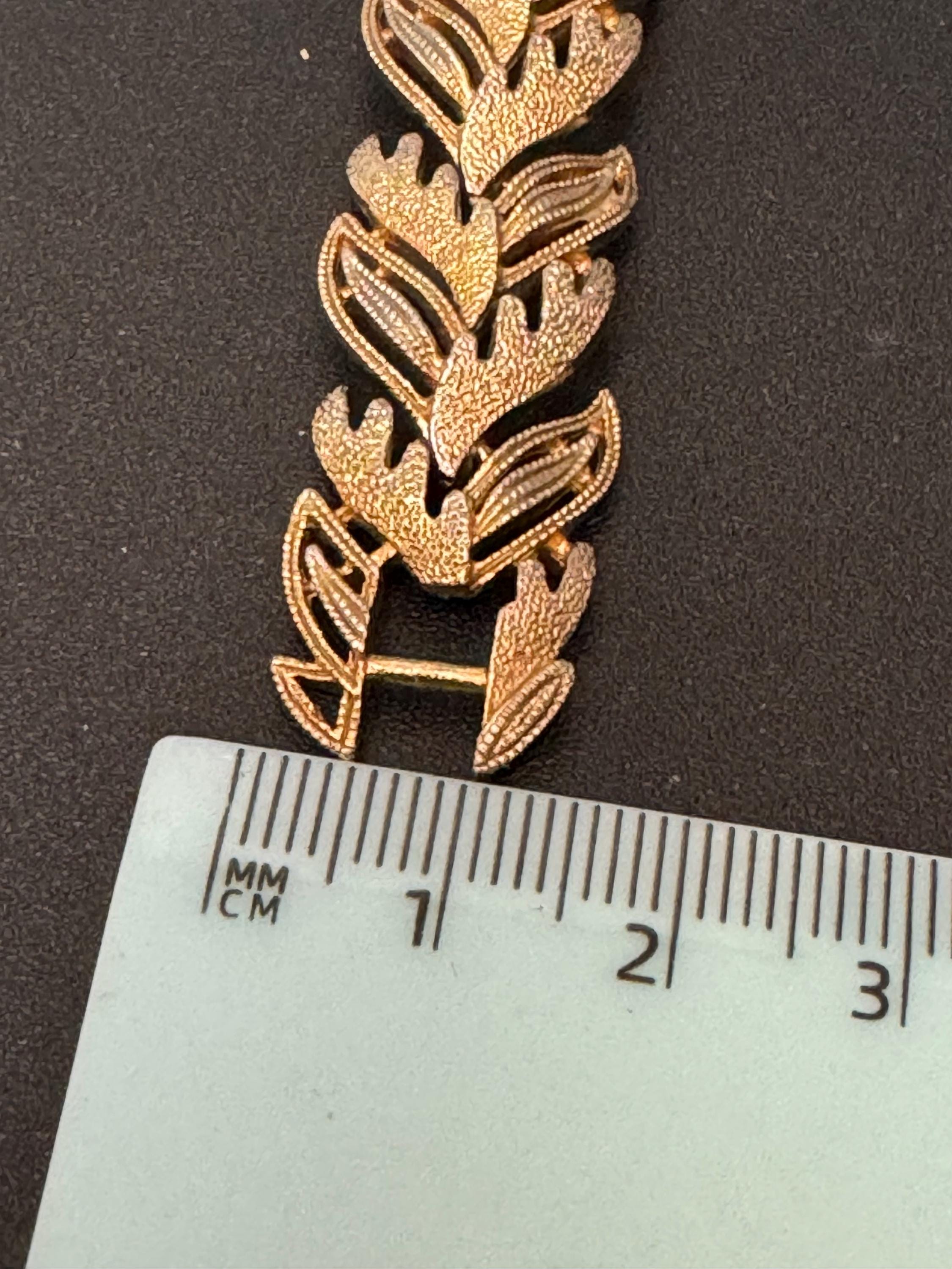 Vintage champagne gold tone textured leaf design modernist panel link bracelet