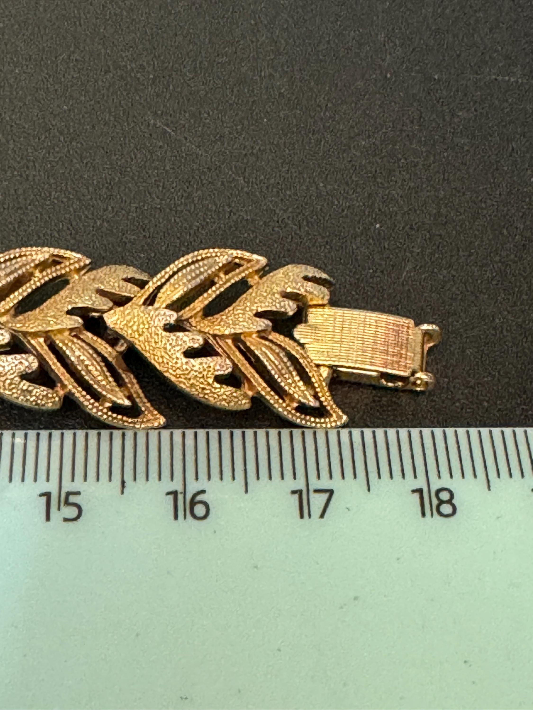 Vintage champagne gold tone textured leaf design modernist panel link bracelet