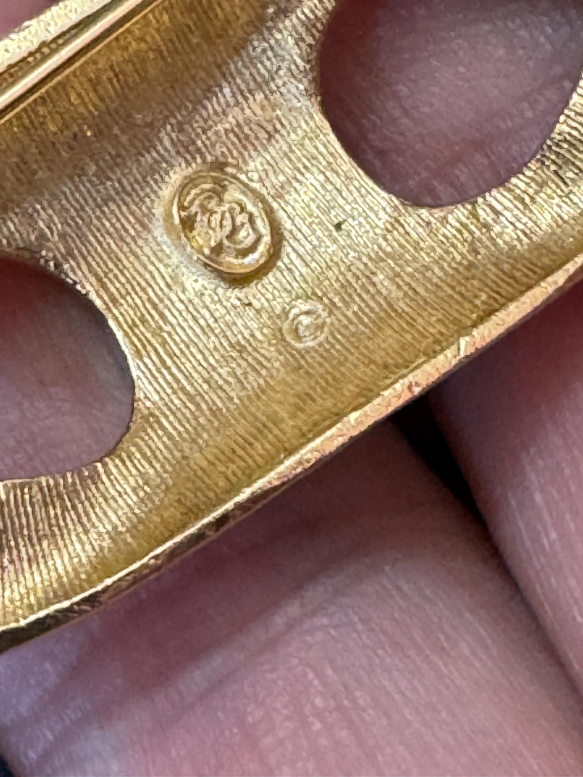 Signed BG bergdorf Goodman small gold tone diamanté lapel brooch