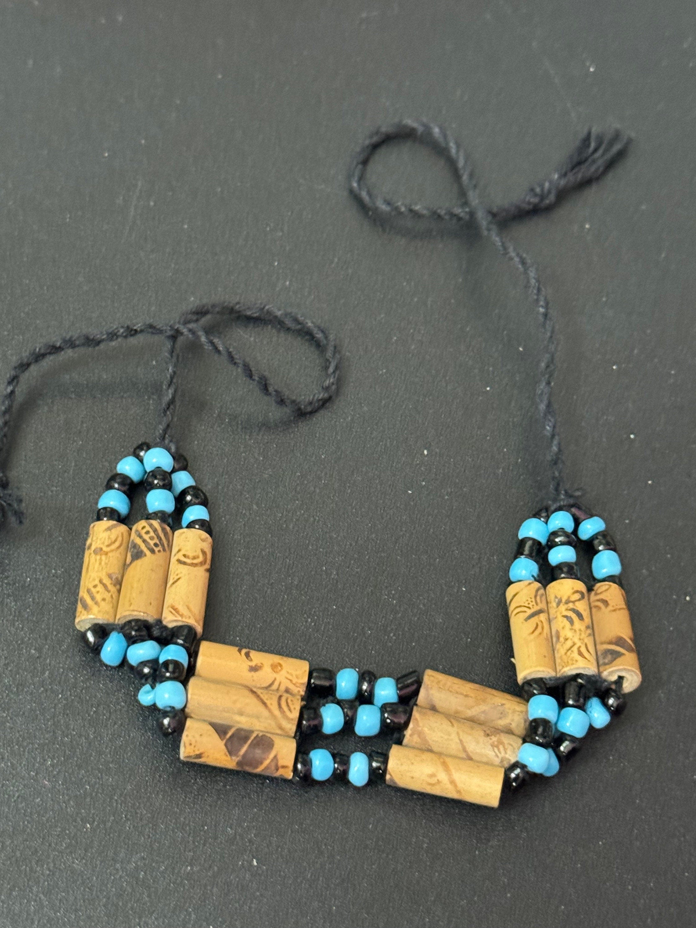 Retro turquoise blue and black wooden natural  beaded tie up bracelet unisex boho beach festival jewellery range