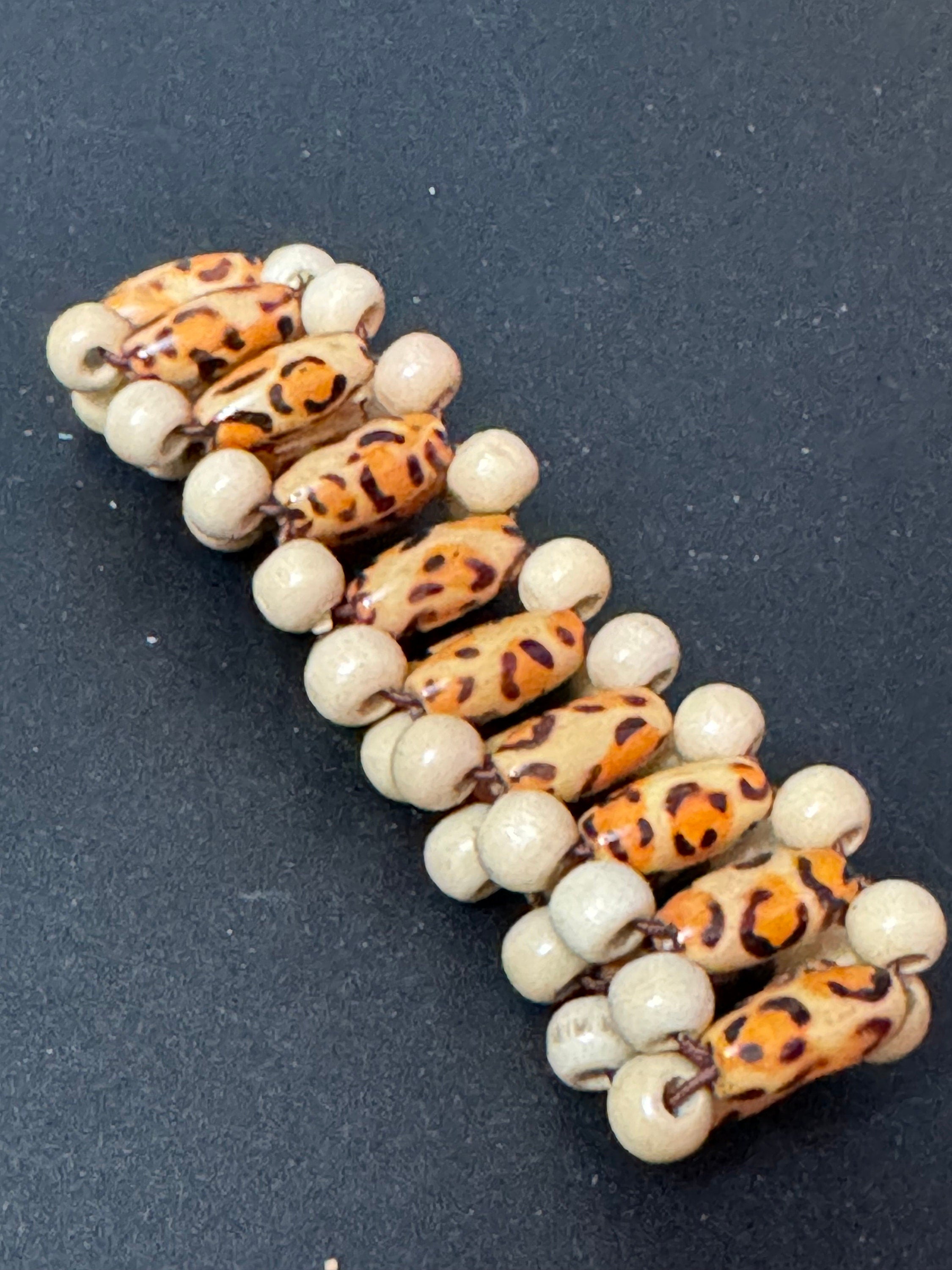 Retro triple row leopard print brown wood and natural nut beaded elasticated stretch bracelet unisex boho beach festival jewellery range