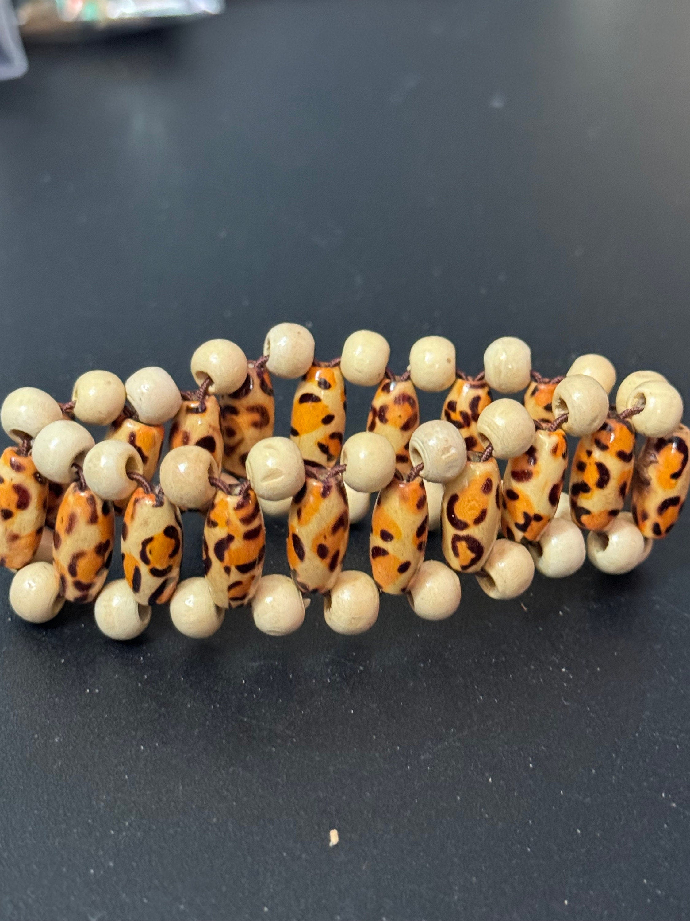 Retro triple row leopard print brown wood and natural nut beaded elasticated stretch bracelet unisex boho beach festival jewellery range
