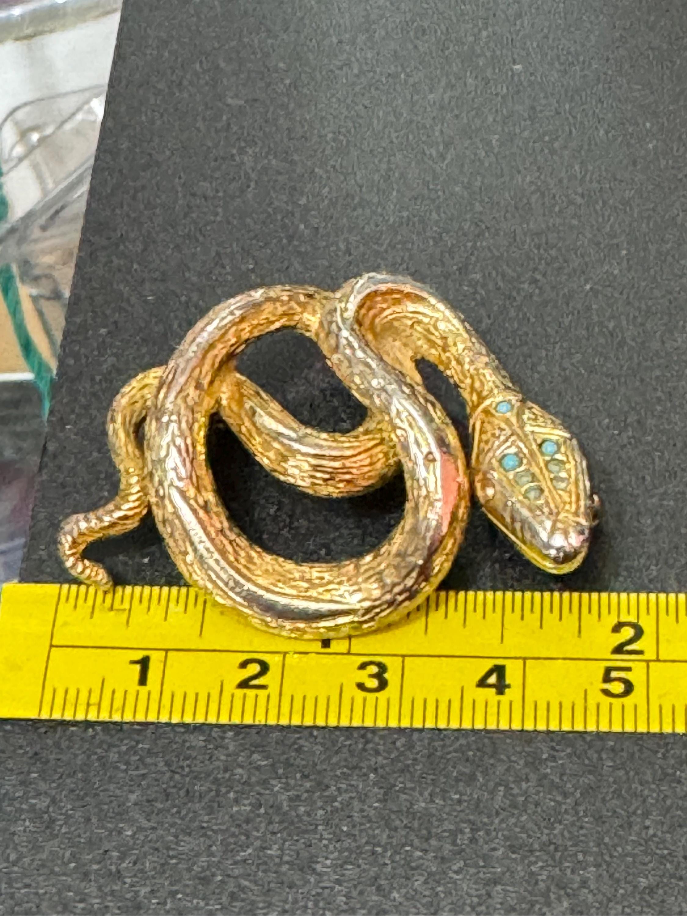 Signed sphinx Vintage gold tone snake brooch with turquoise blue eyes vintage
