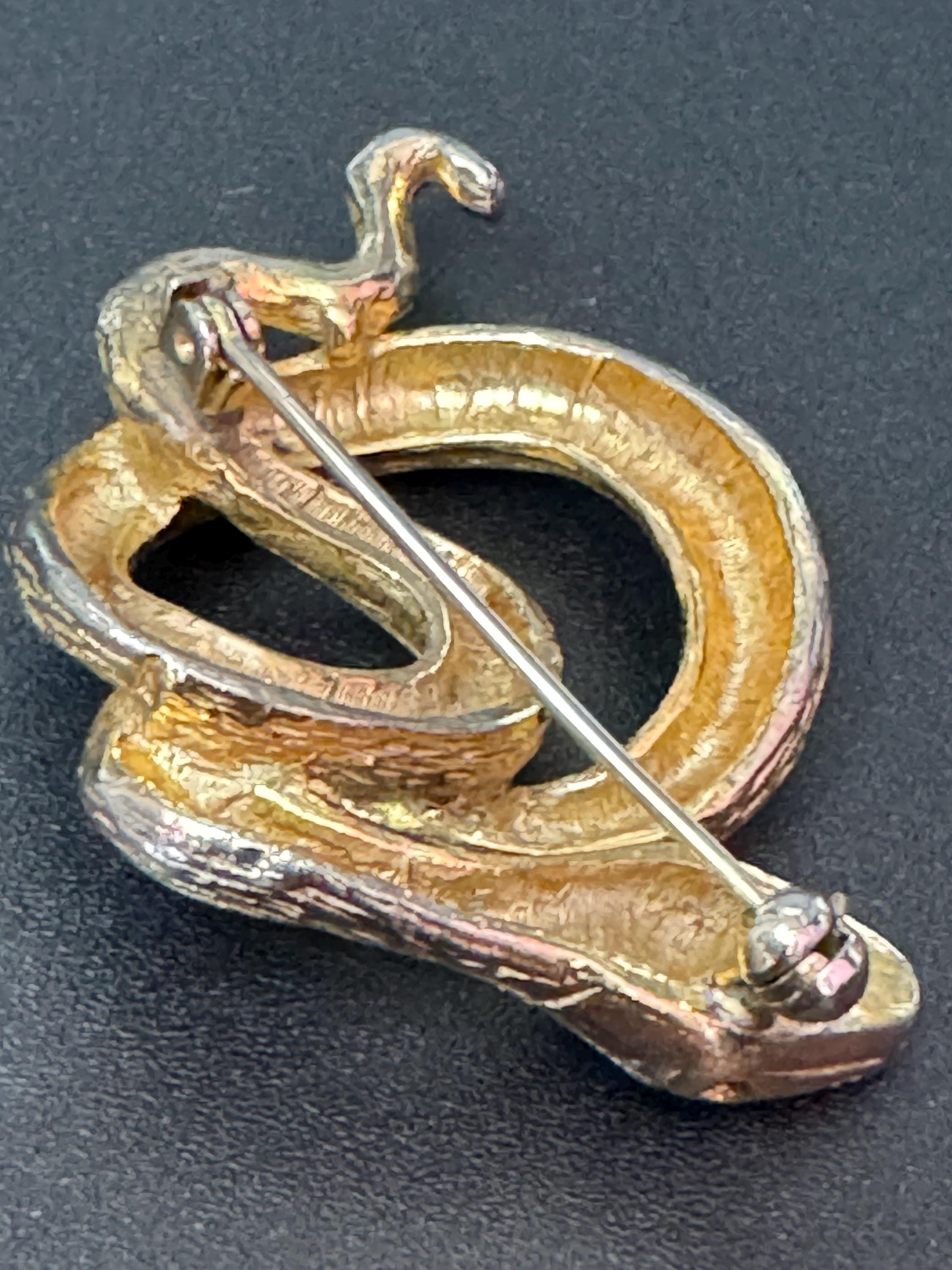Signed sphinx Vintage gold tone snake brooch with turquoise blue eyes vintage