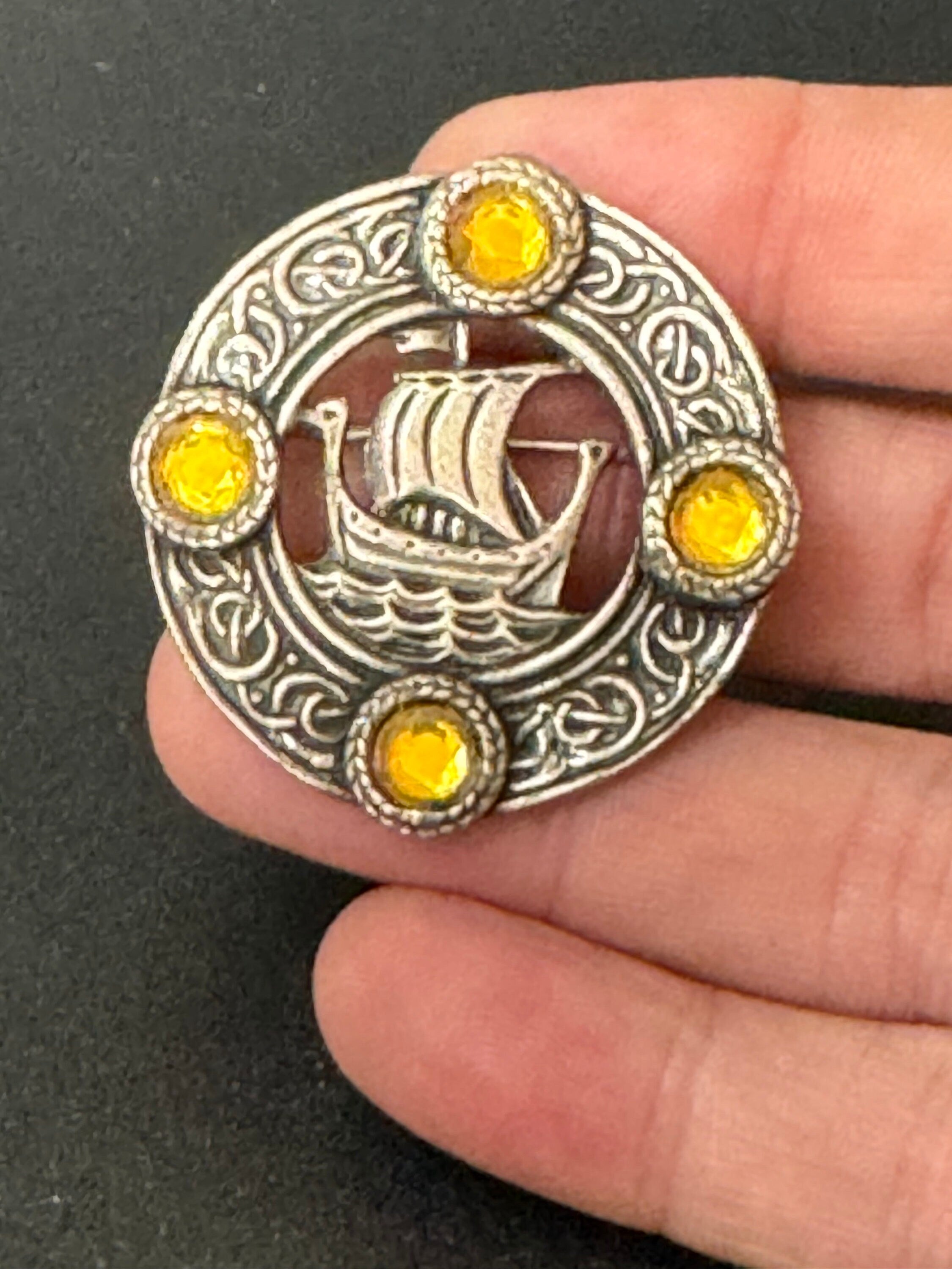 vintage round silver tone Etruscan Viking longship Nordic medallion shield brooch with amber cabochons