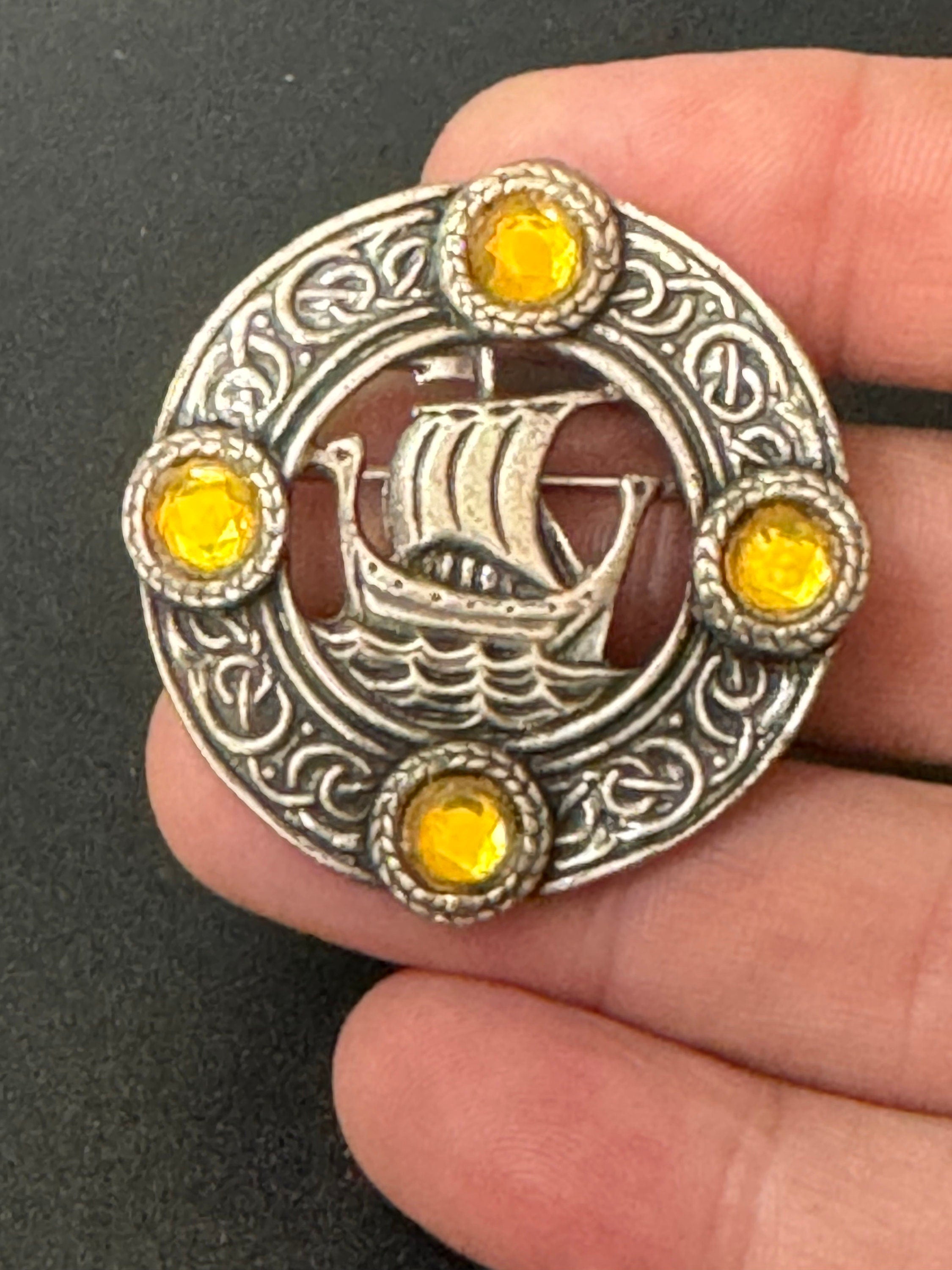 vintage round silver tone Etruscan Viking longship Nordic medallion shield brooch with amber cabochons