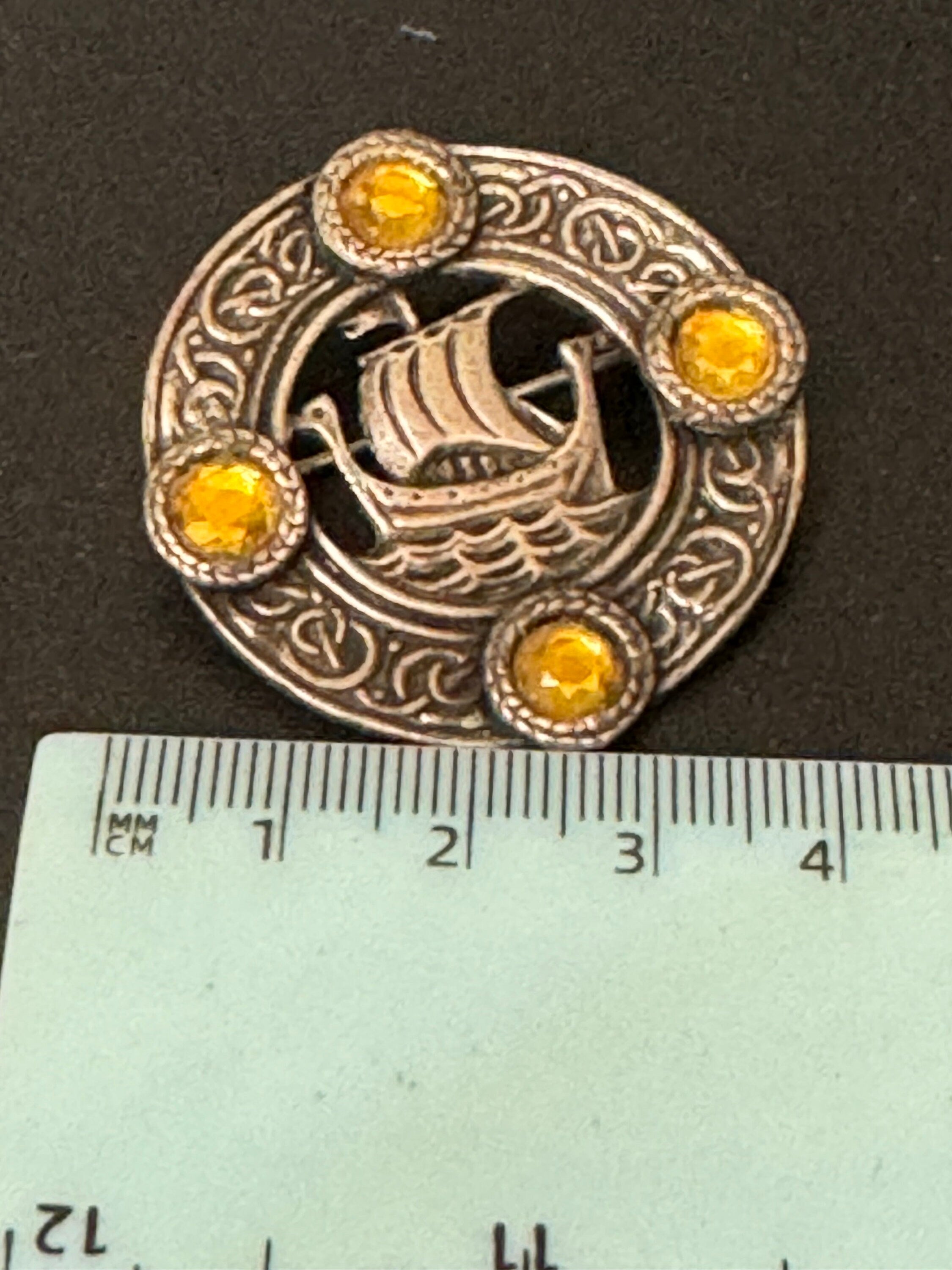 vintage round silver tone Etruscan Viking longship Nordic medallion shield brooch with amber cabochons