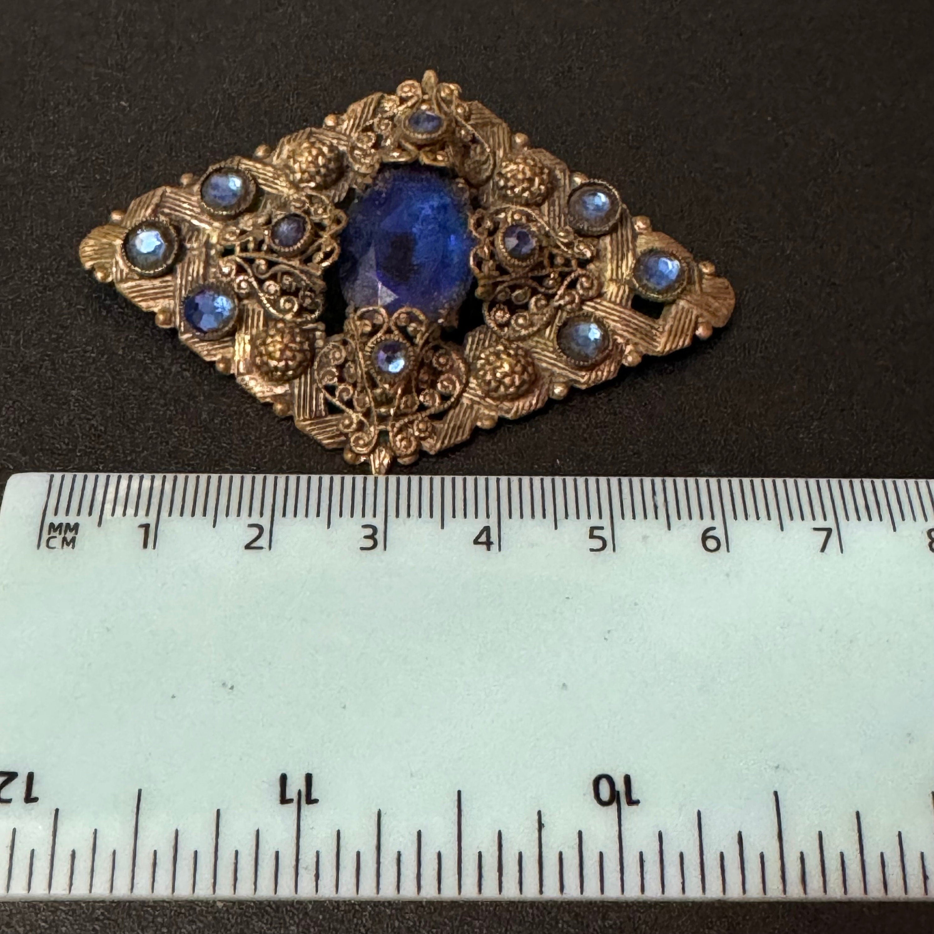 Vintage Czech Art Deco Brooch: Stamped Brass, Blue Glass Diamanté