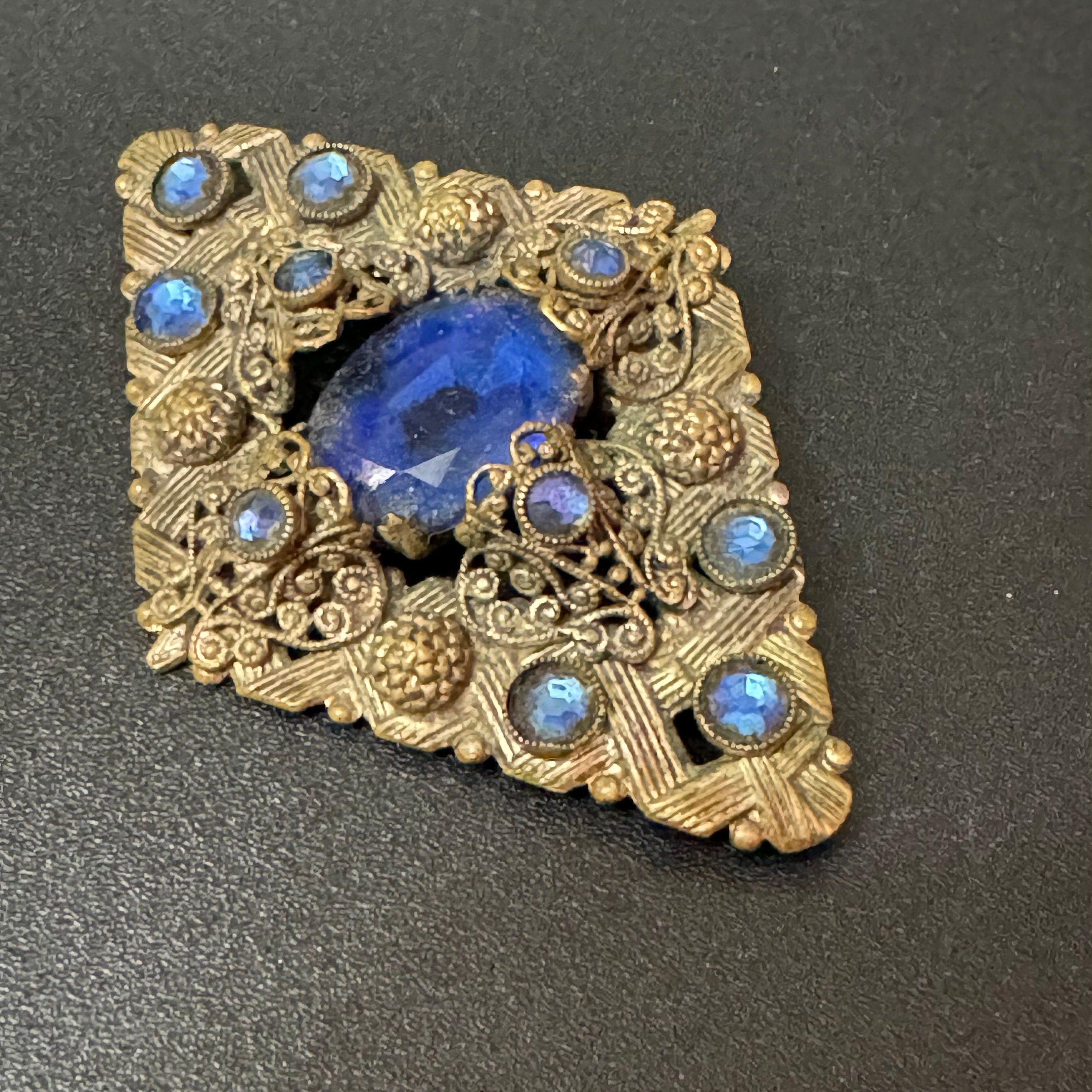 Vintage Czech Art Deco Brooch: Stamped Brass, Blue Glass Diamanté