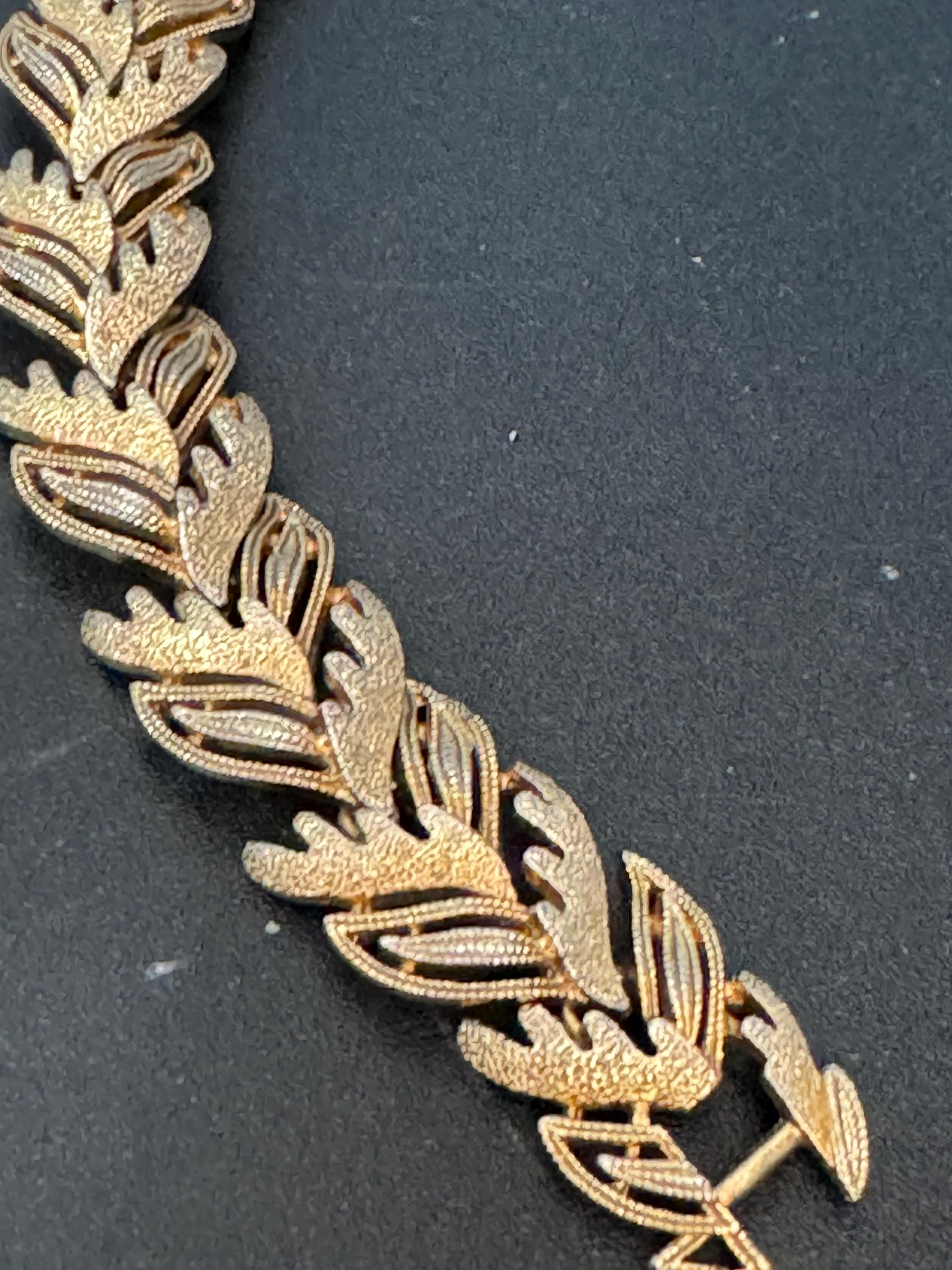 Vintage champagne gold tone textured leaf design modernist panel link bracelet
