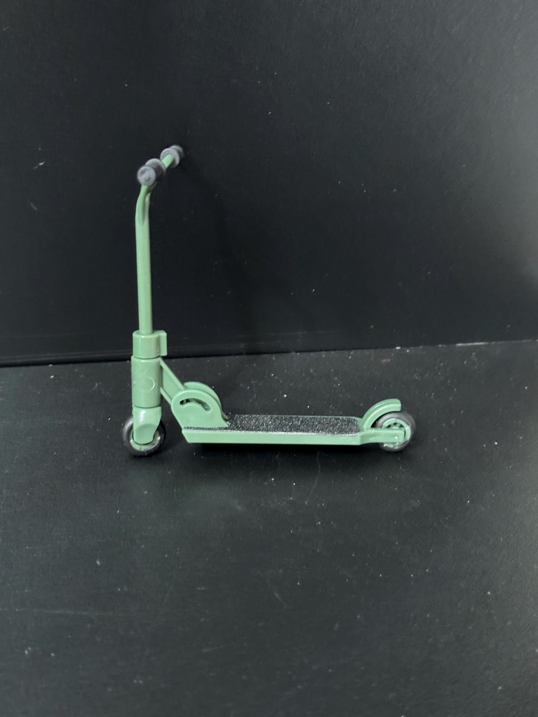 Miniature folding scooter cake topper decoration choice of colours plastic finger operated Childs toy