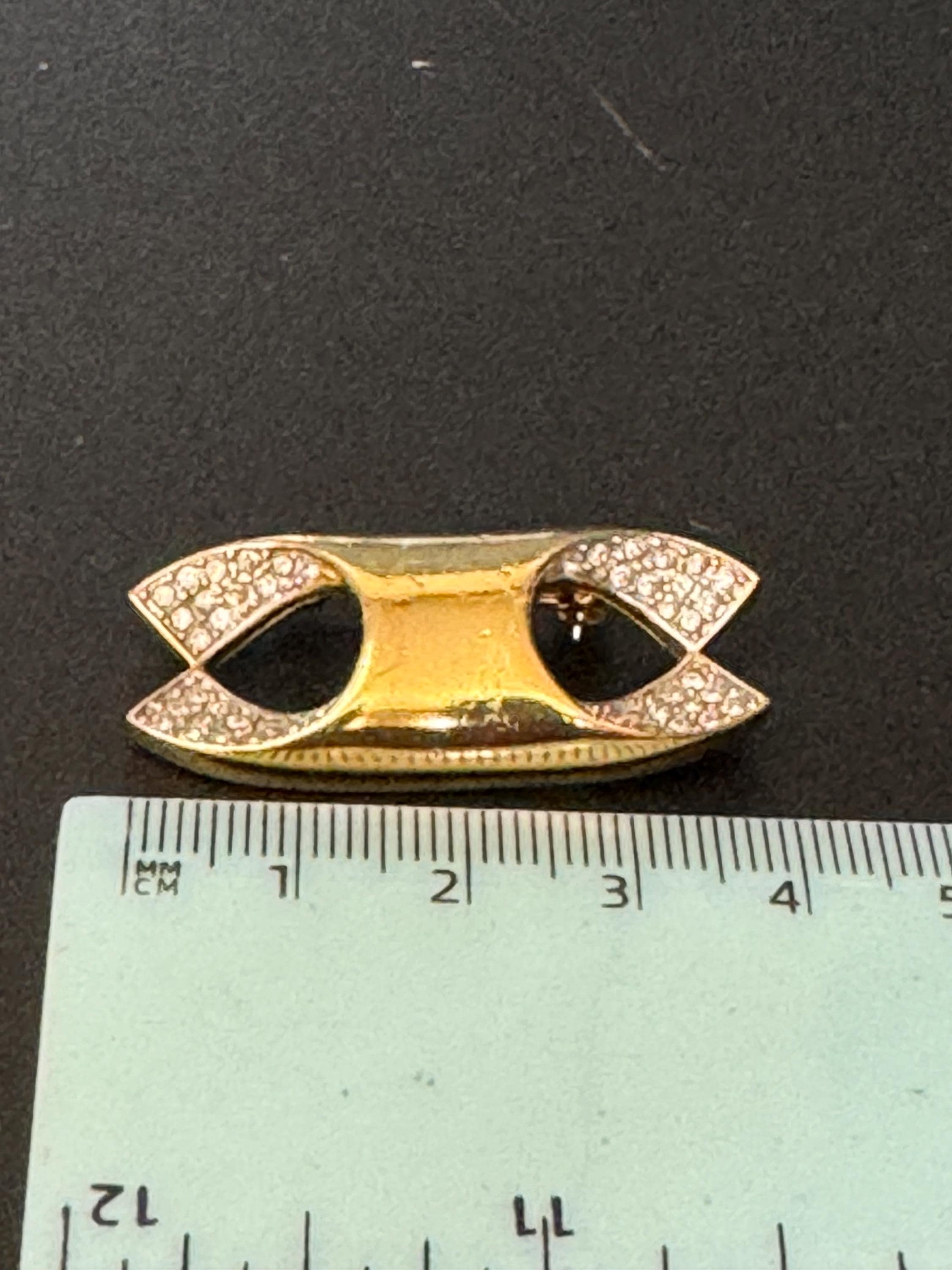 Signed BG bergdorf Goodman small gold tone diamanté lapel brooch
