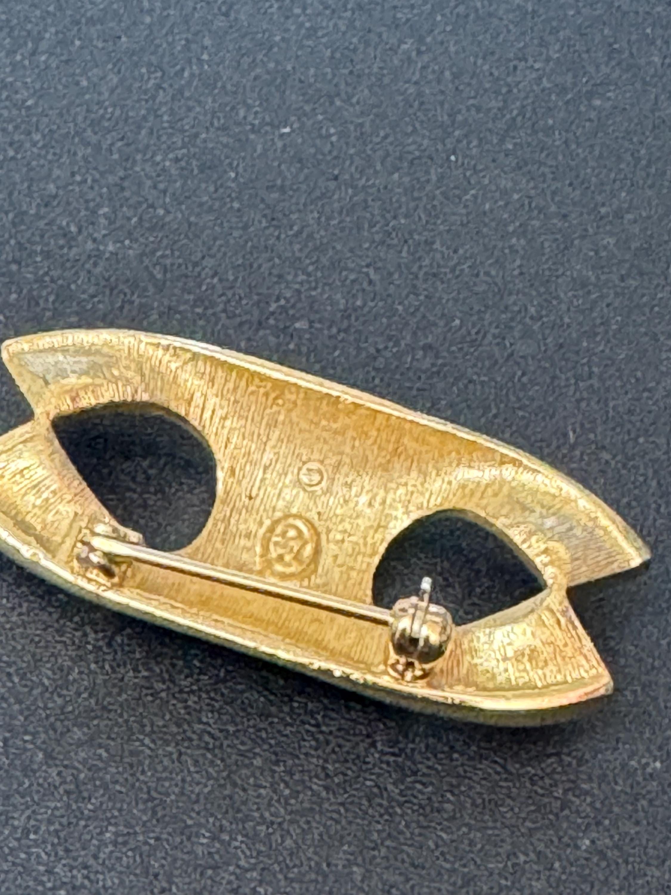Signed BG bergdorf Goodman small gold tone diamanté lapel brooch