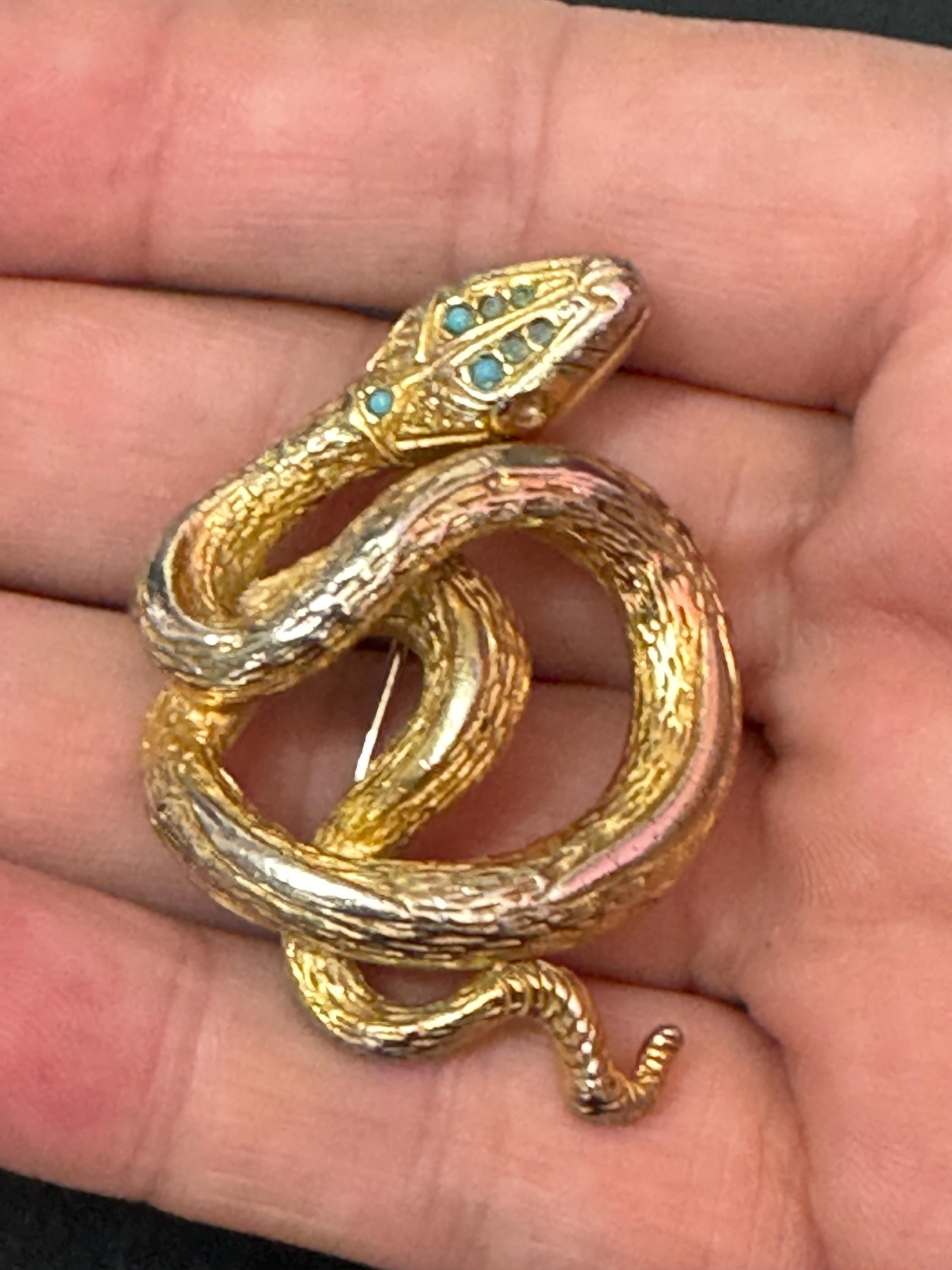 Signed sphinx Vintage gold tone snake brooch with turquoise blue eyes vintage