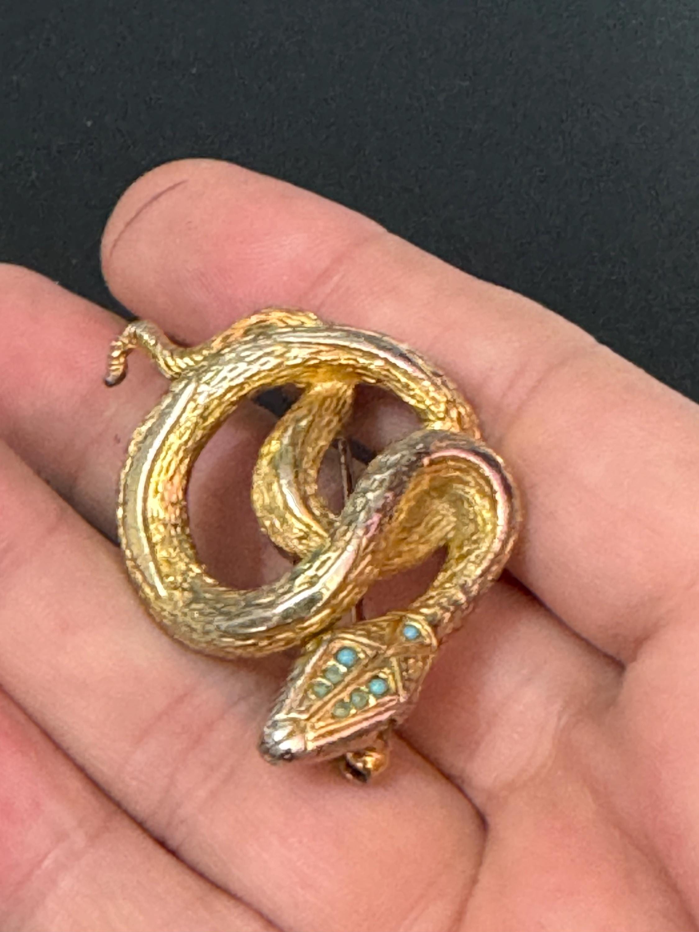 Signed sphinx Vintage gold tone snake brooch with turquoise blue eyes vintage