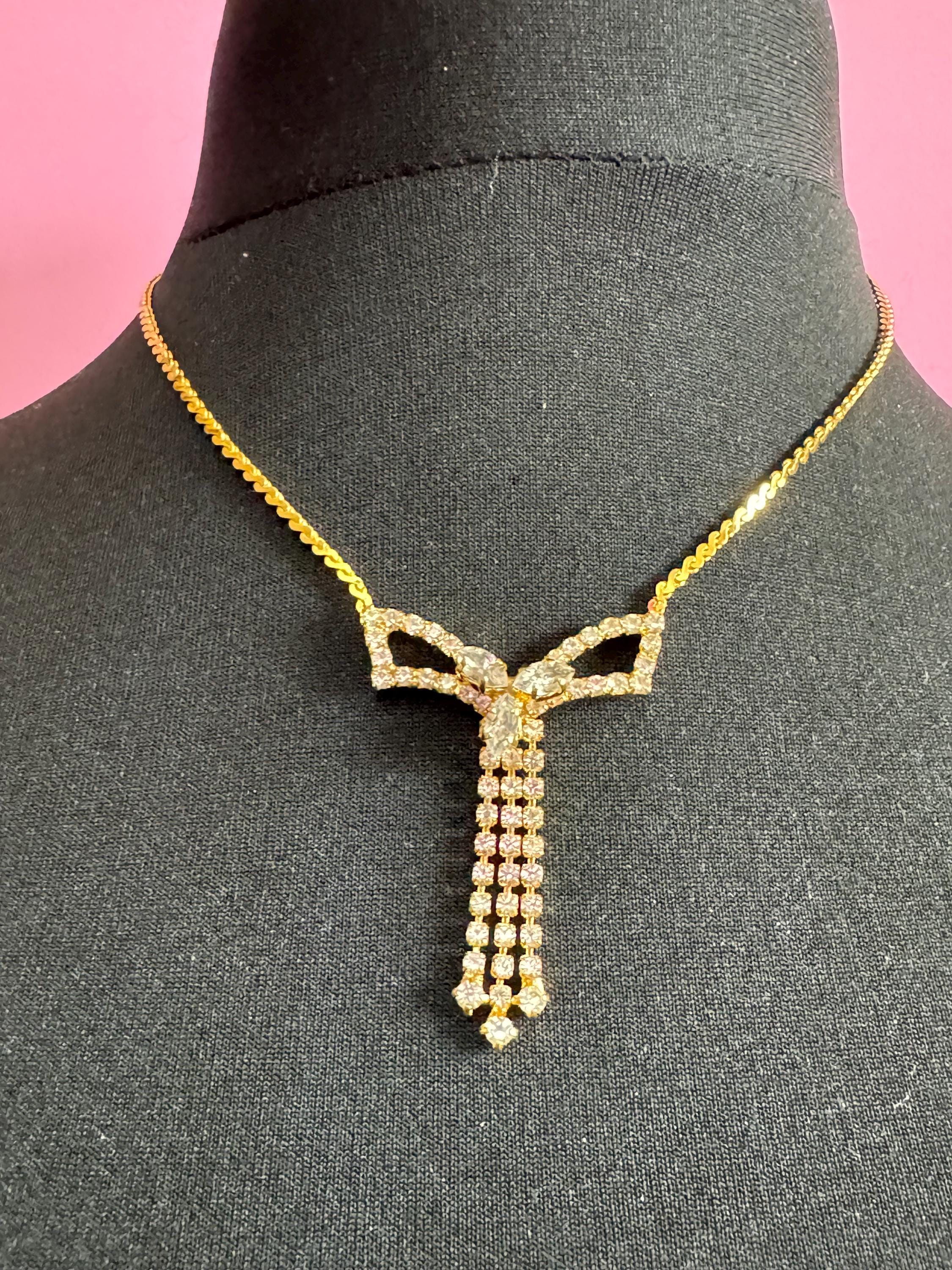 Vintage gold tone serpentine chain lariat drop bow necklace with clear diamanté glass paste stones