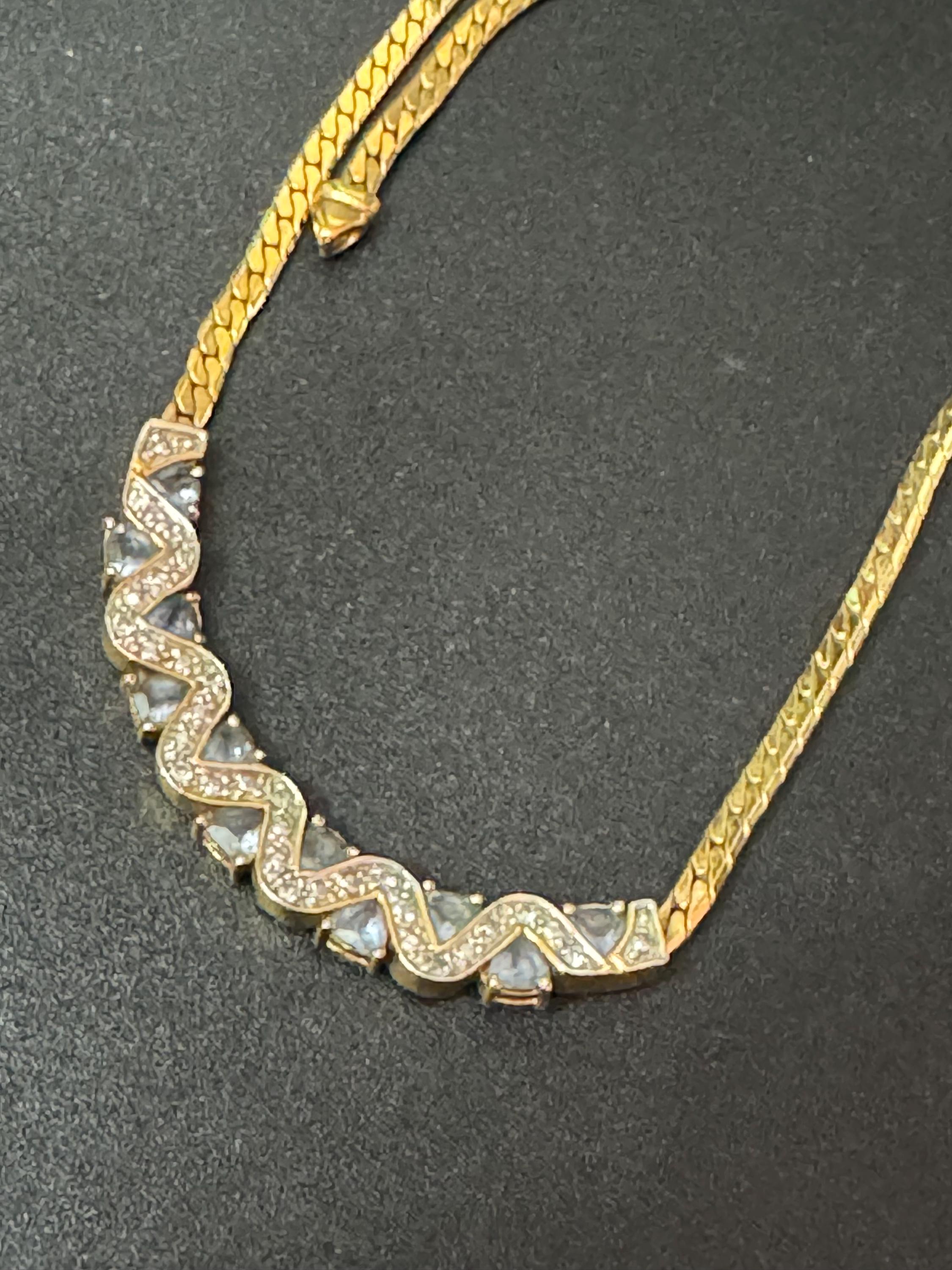 Vintage gold tone flat chain necklace with soft aquamarine blue and clear glass paste diamanté
