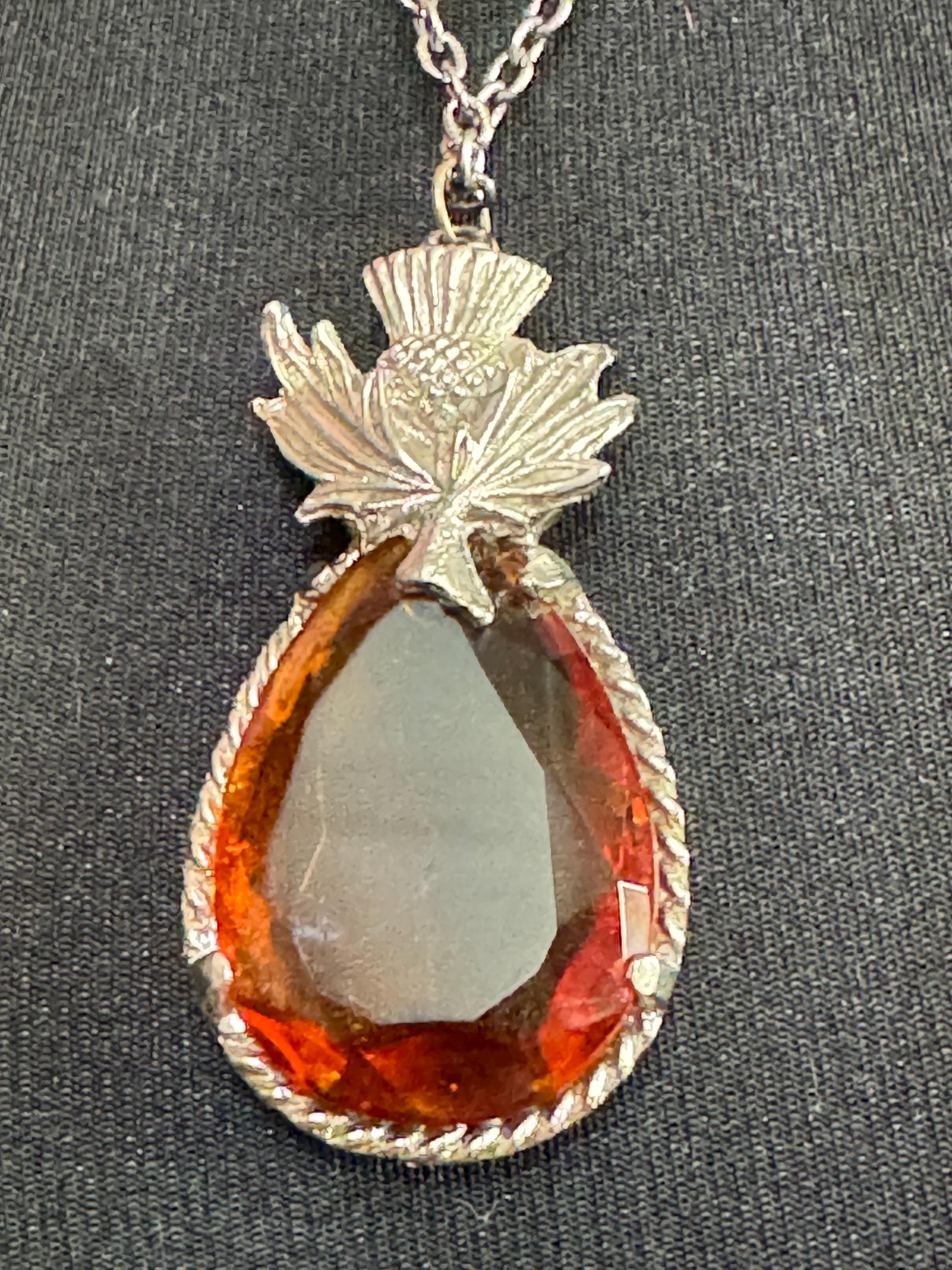 Scottish thistle silver tone orange faceted Glass teardrop pendant on 60cm chain Vintage