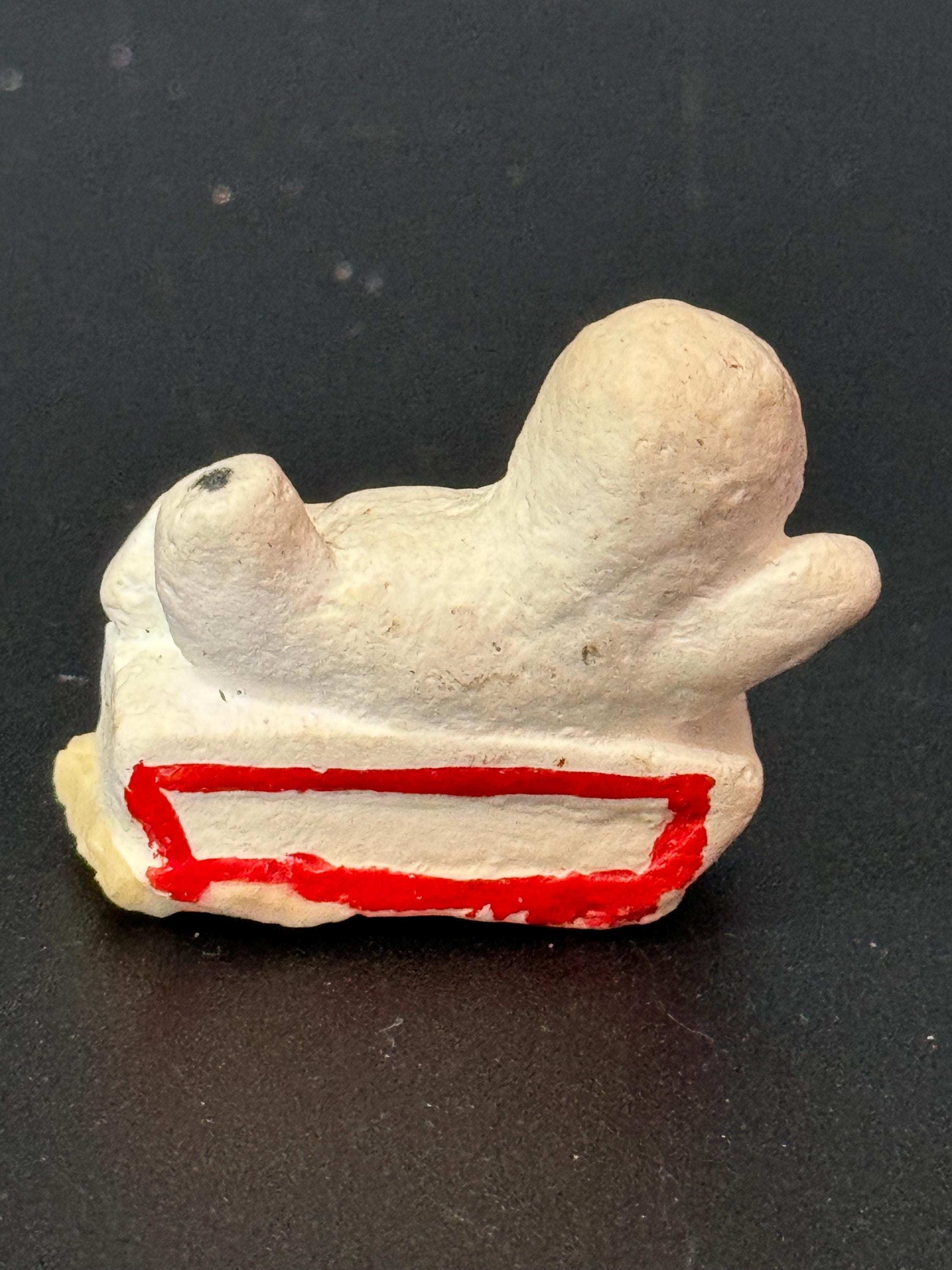 Antique Vintage PLASTER or bisque Snow Baby on sledge Christmas Xmas Cake topper