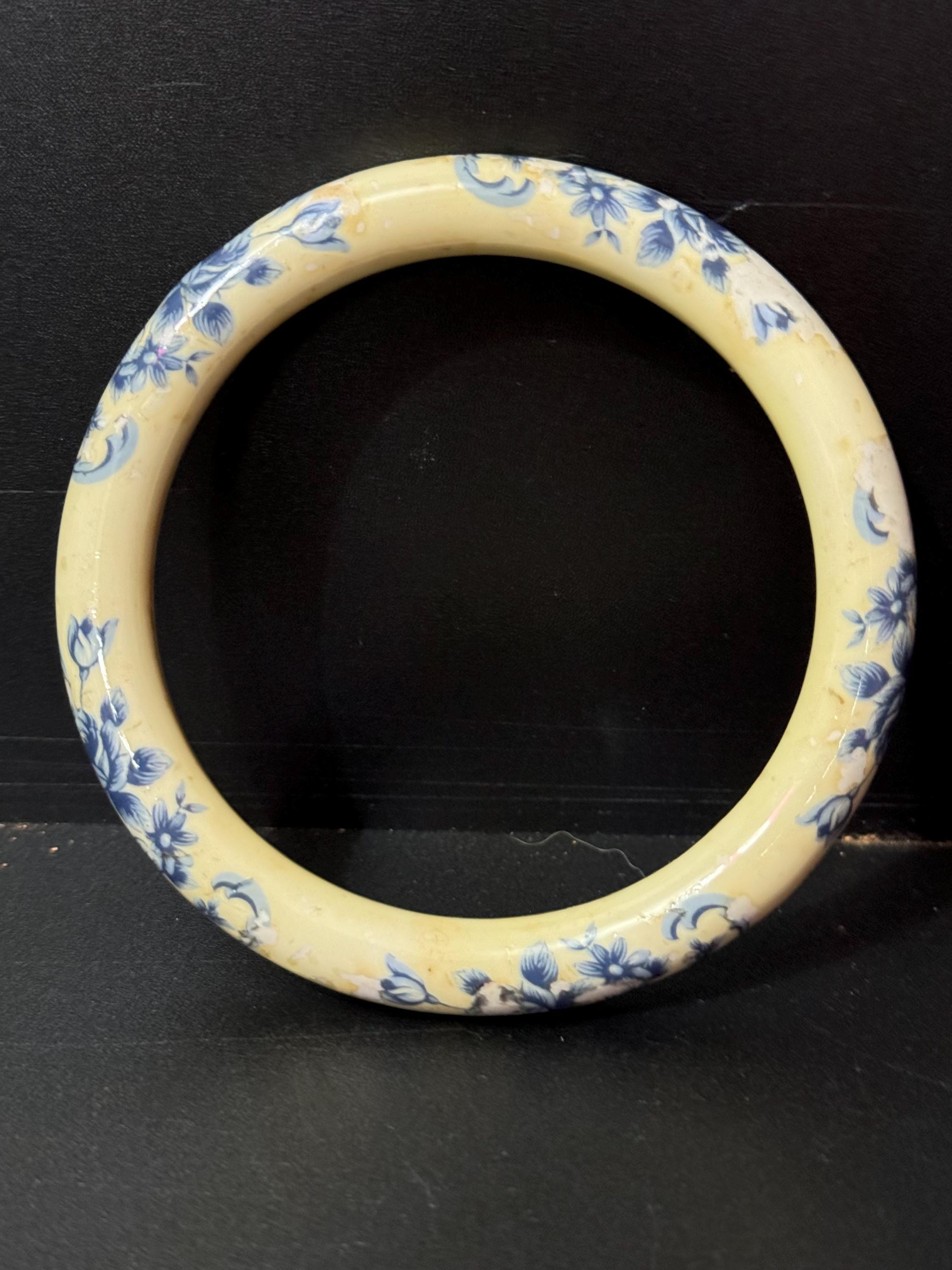 Antique ceramic Art Deco Period Cream bangle bracelet transfer printed with blue floral roses