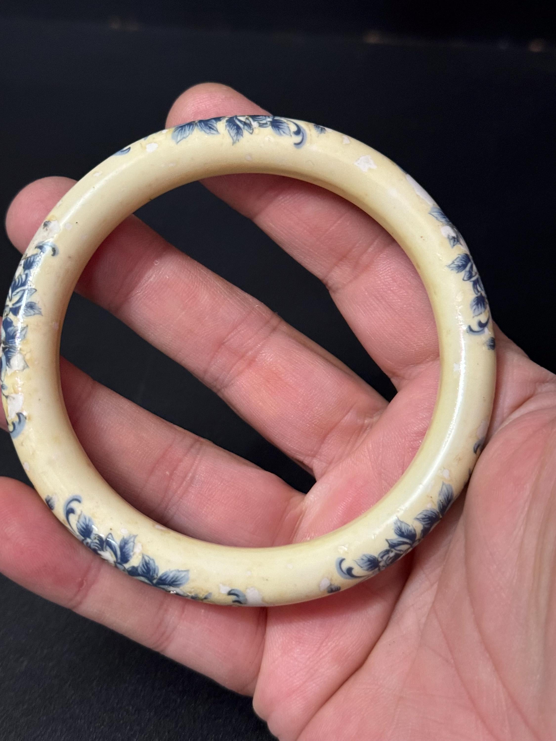 Antique ceramic Art Deco Period Cream bangle bracelet transfer printed with blue floral roses