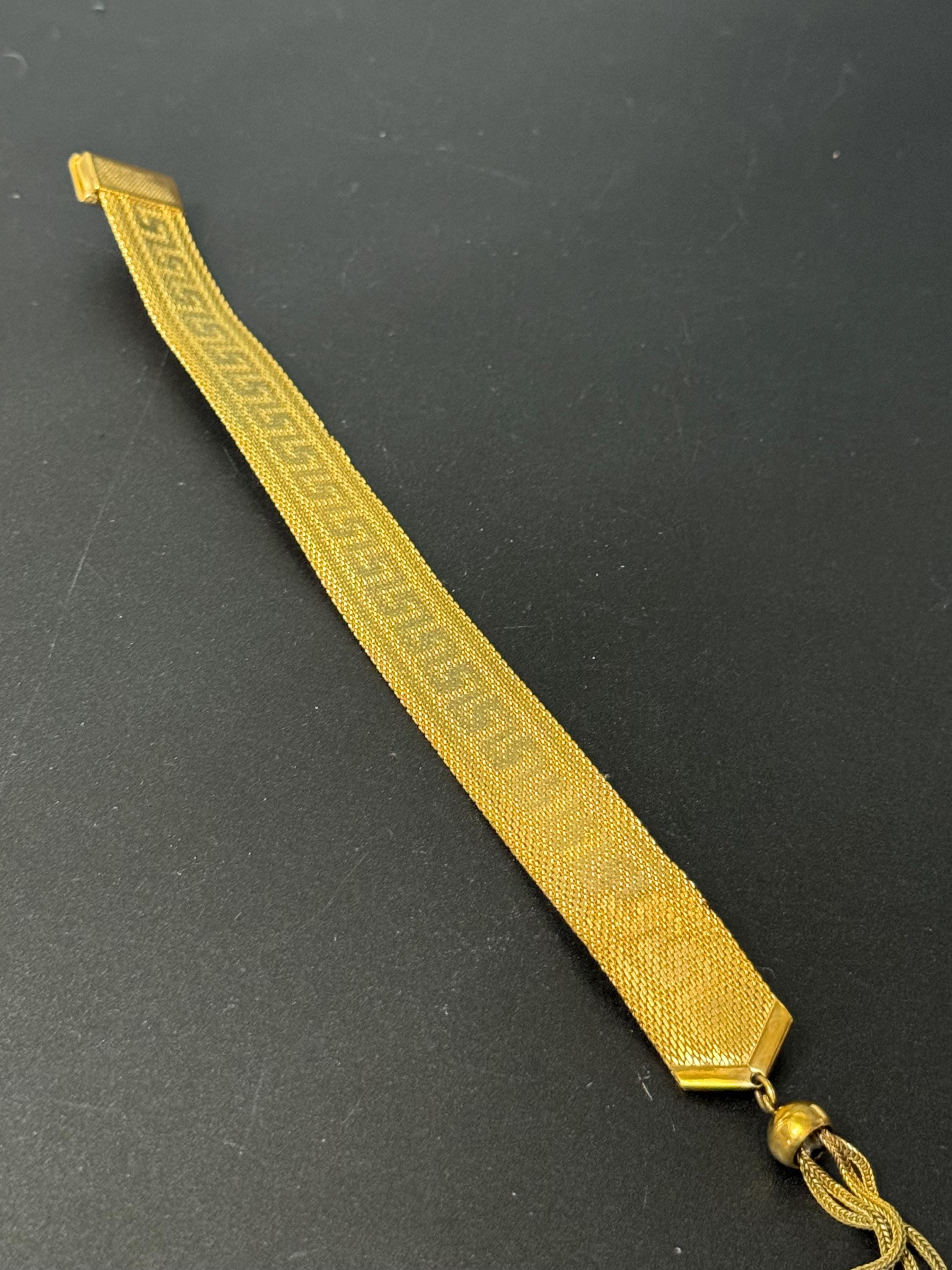 1970s Greek key design gold tone articulated flat 2cm wide tassel bracelet 19.5
