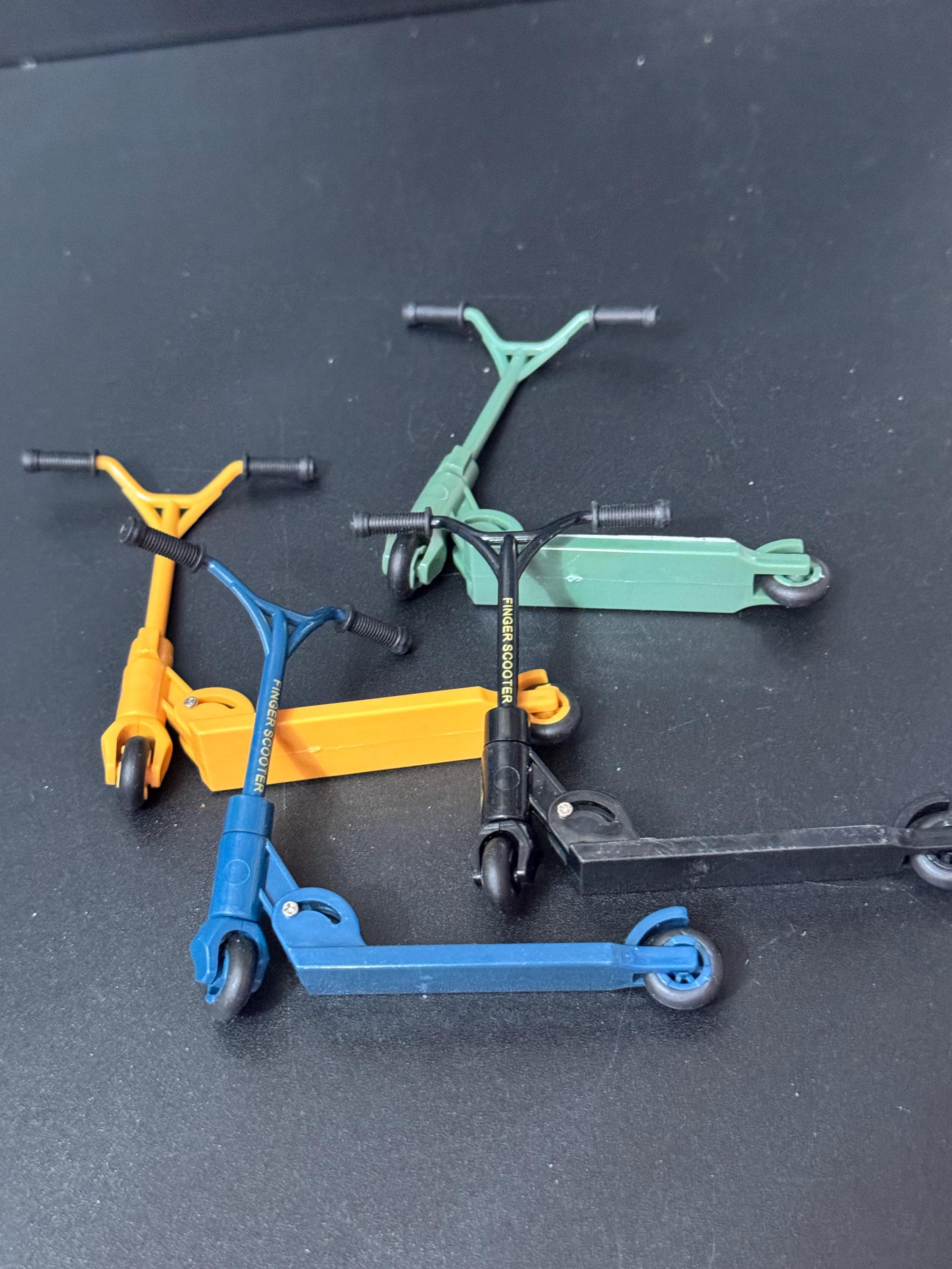 Miniature folding scooter cake topper decoration choice of colours plastic finger operated Childs toy
