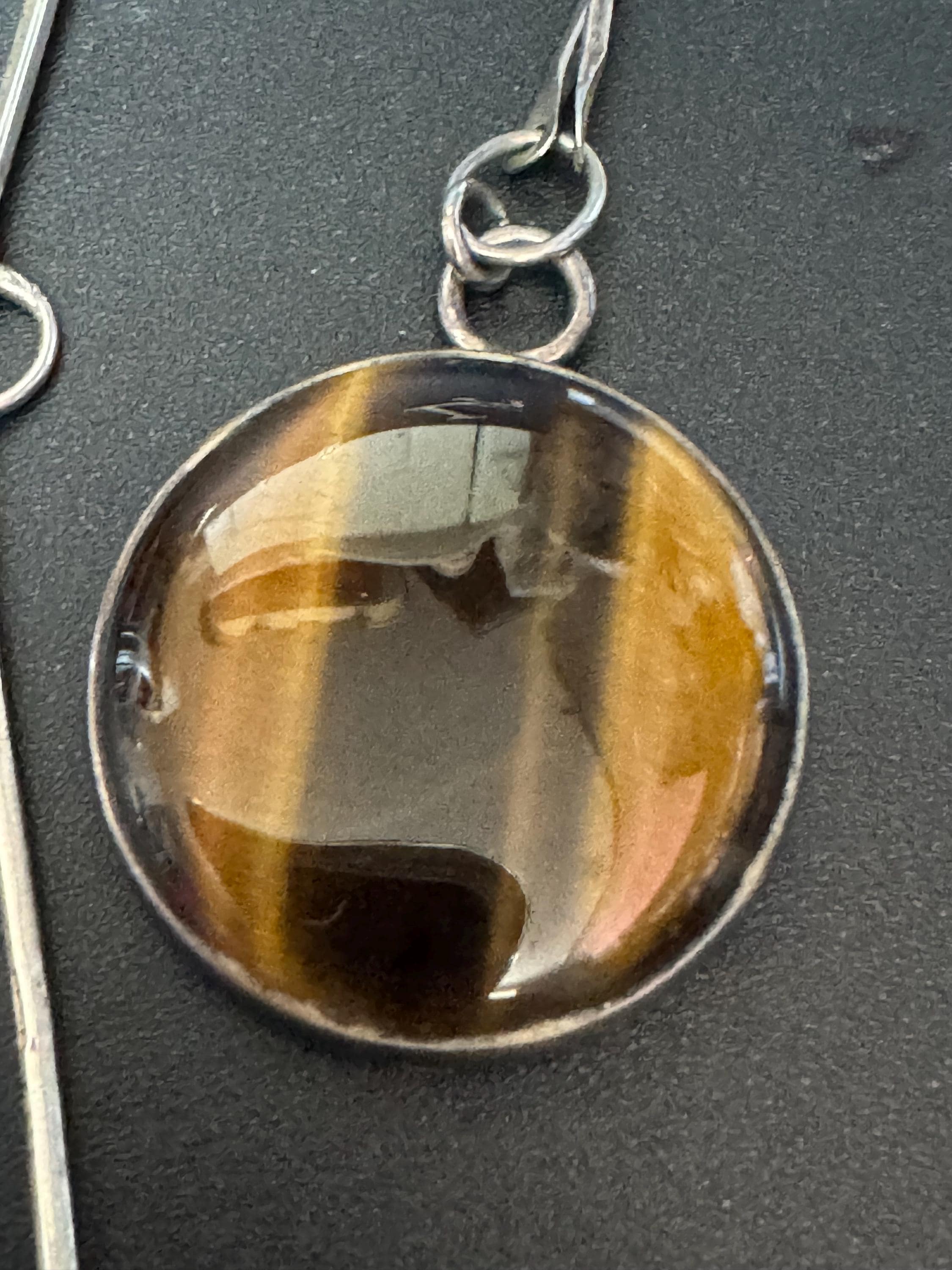 Solid silver long tigers eye round pendant necklace on 75cm chain 917 grade Naples or Malta 1970s weighs 25.5 grams